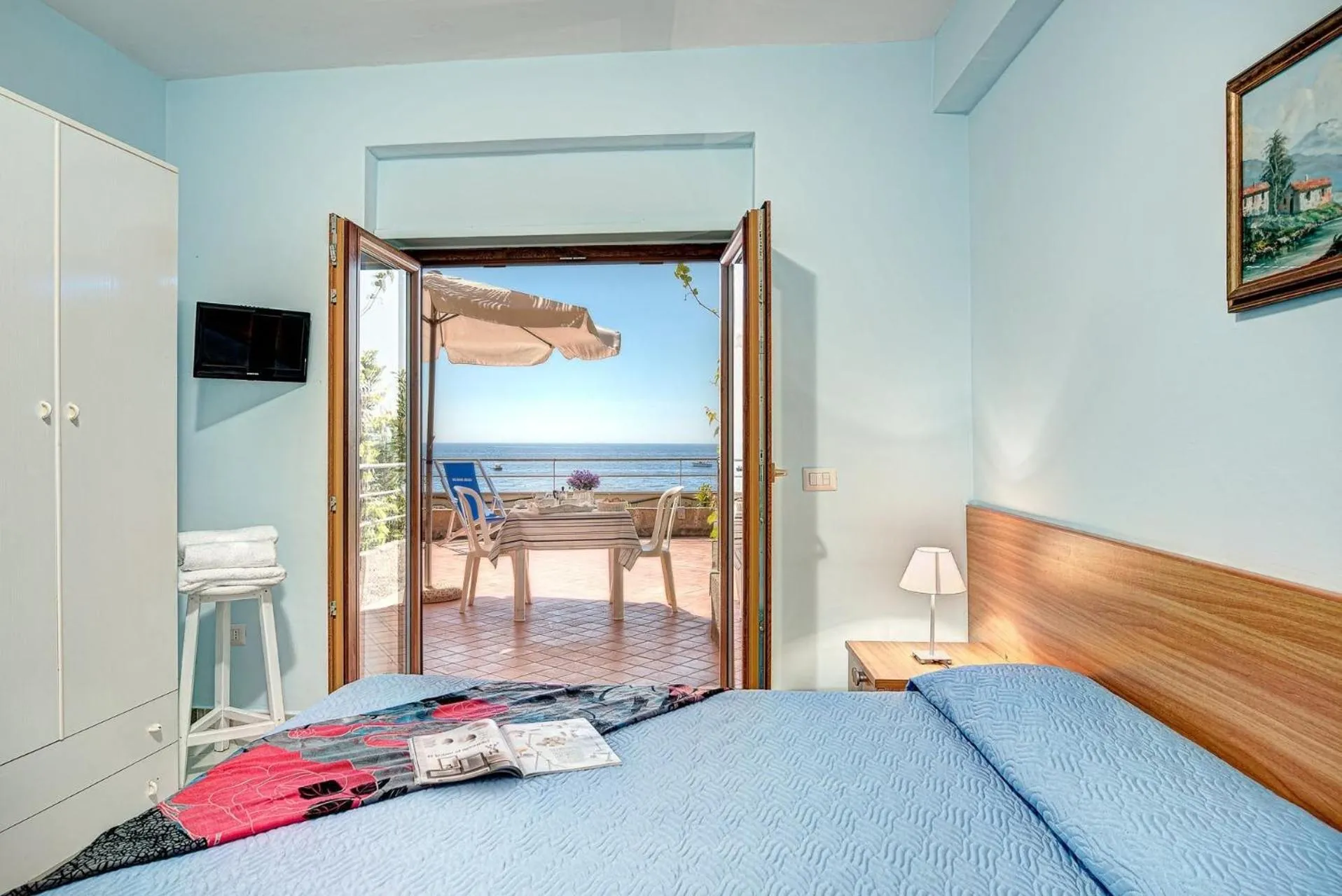Bed in Belmare Residence on the beach