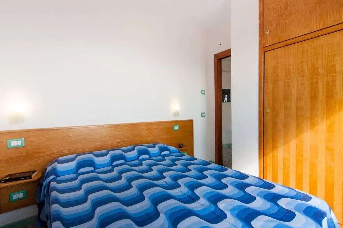 Bed in Belmare Residence on the beach