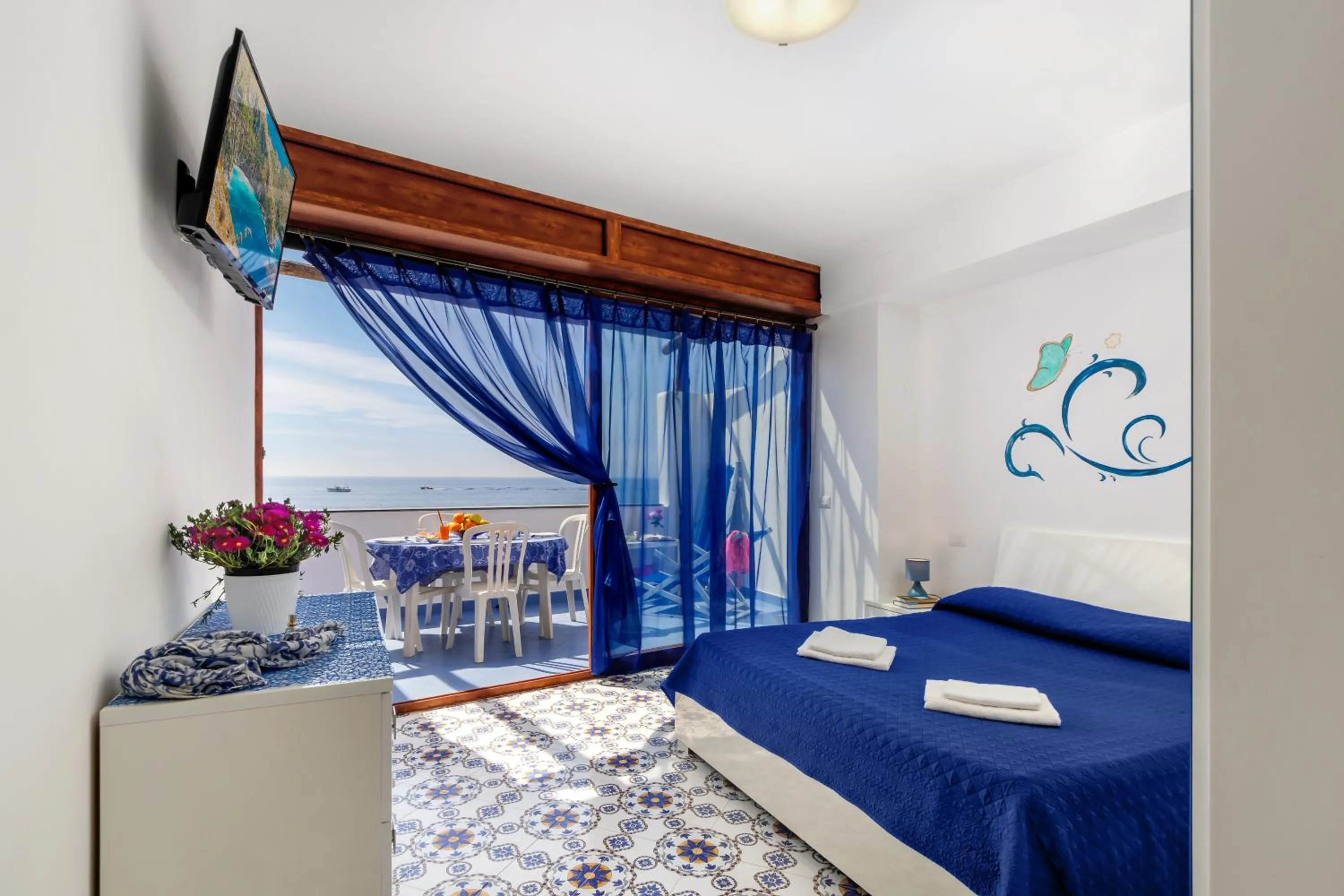 Bed in Belmare Residence on the beach