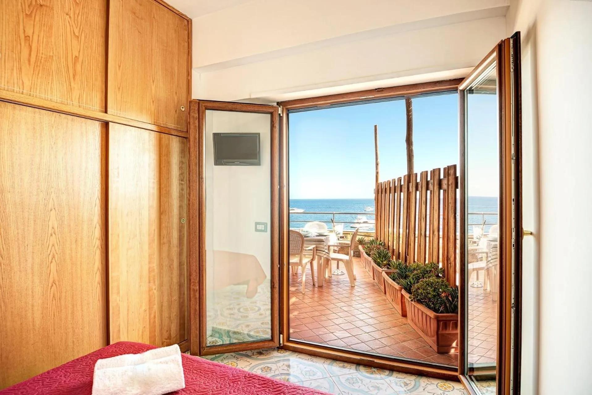 Bed in Belmare Residence on the beach