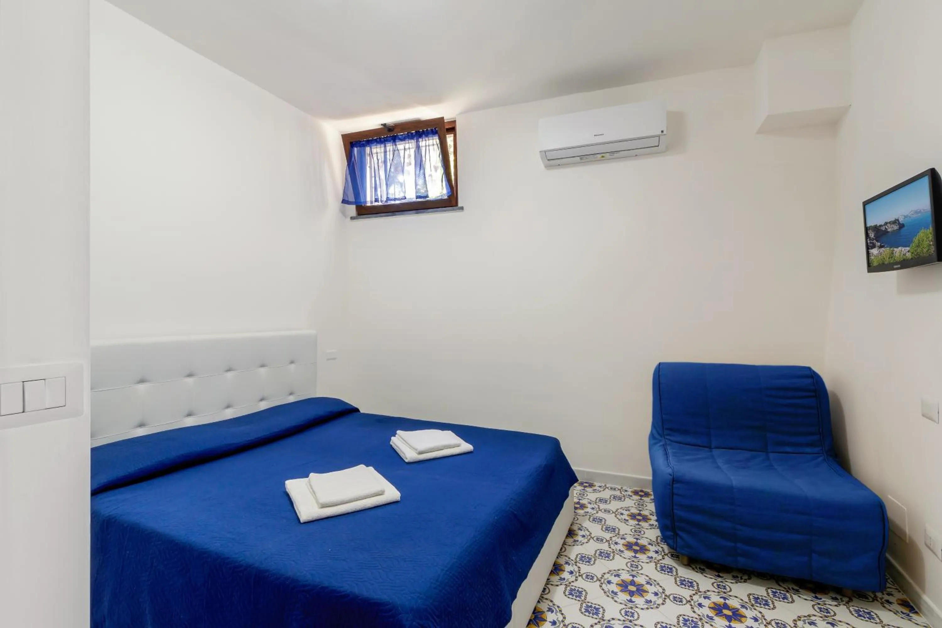 Bed in Belmare Residence on the beach