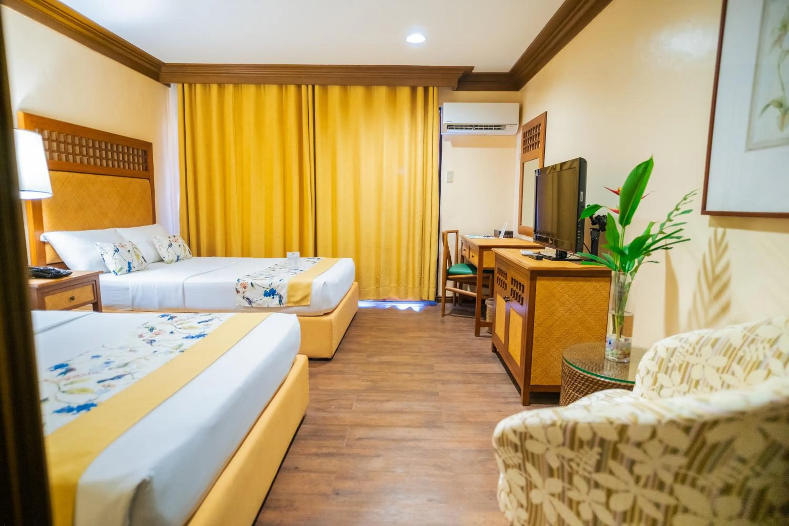 Bed in Boracay Tropics Resort Hotel