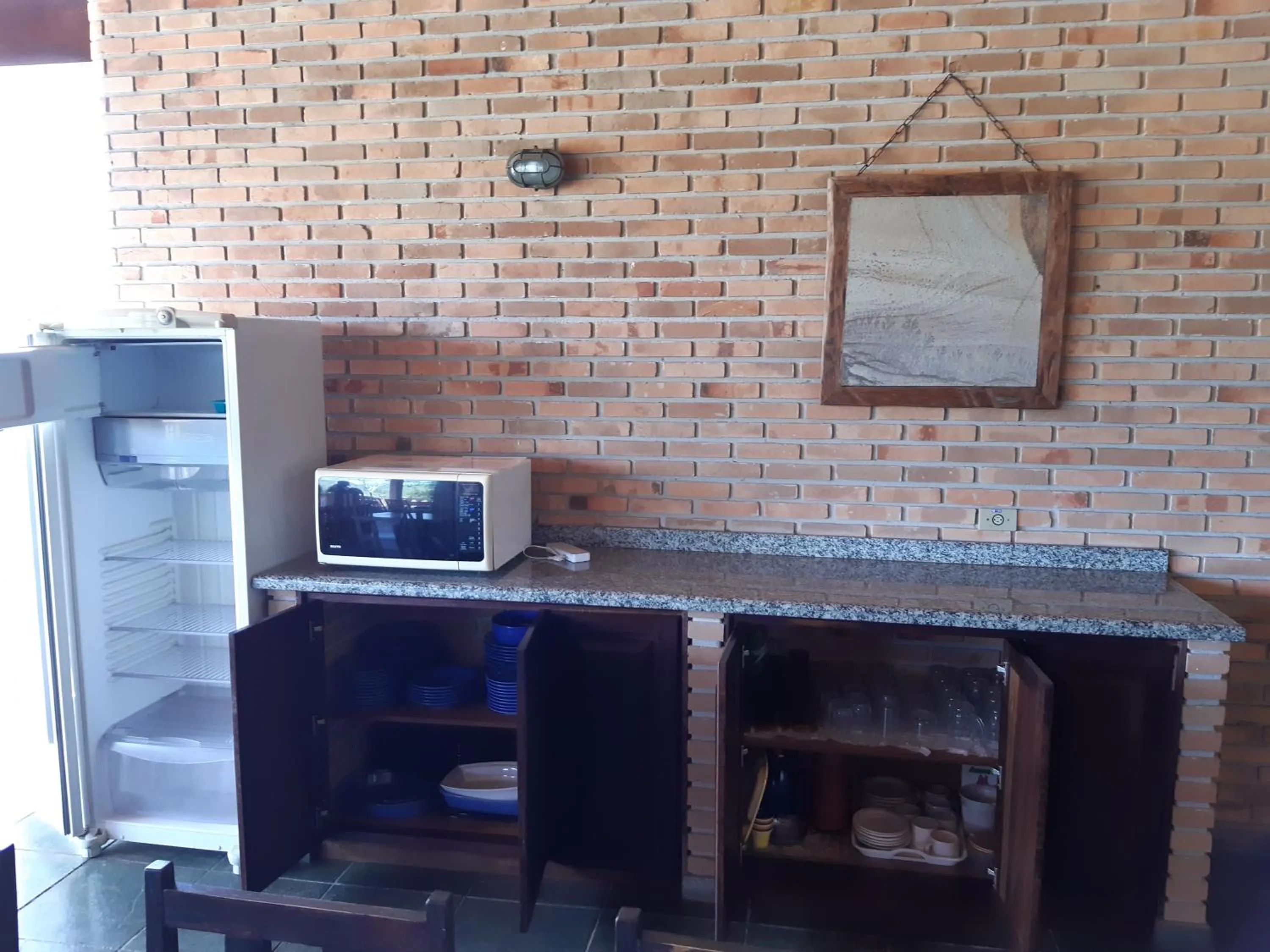 Kitchen or kitchenette in Chalé Karin Sampaio