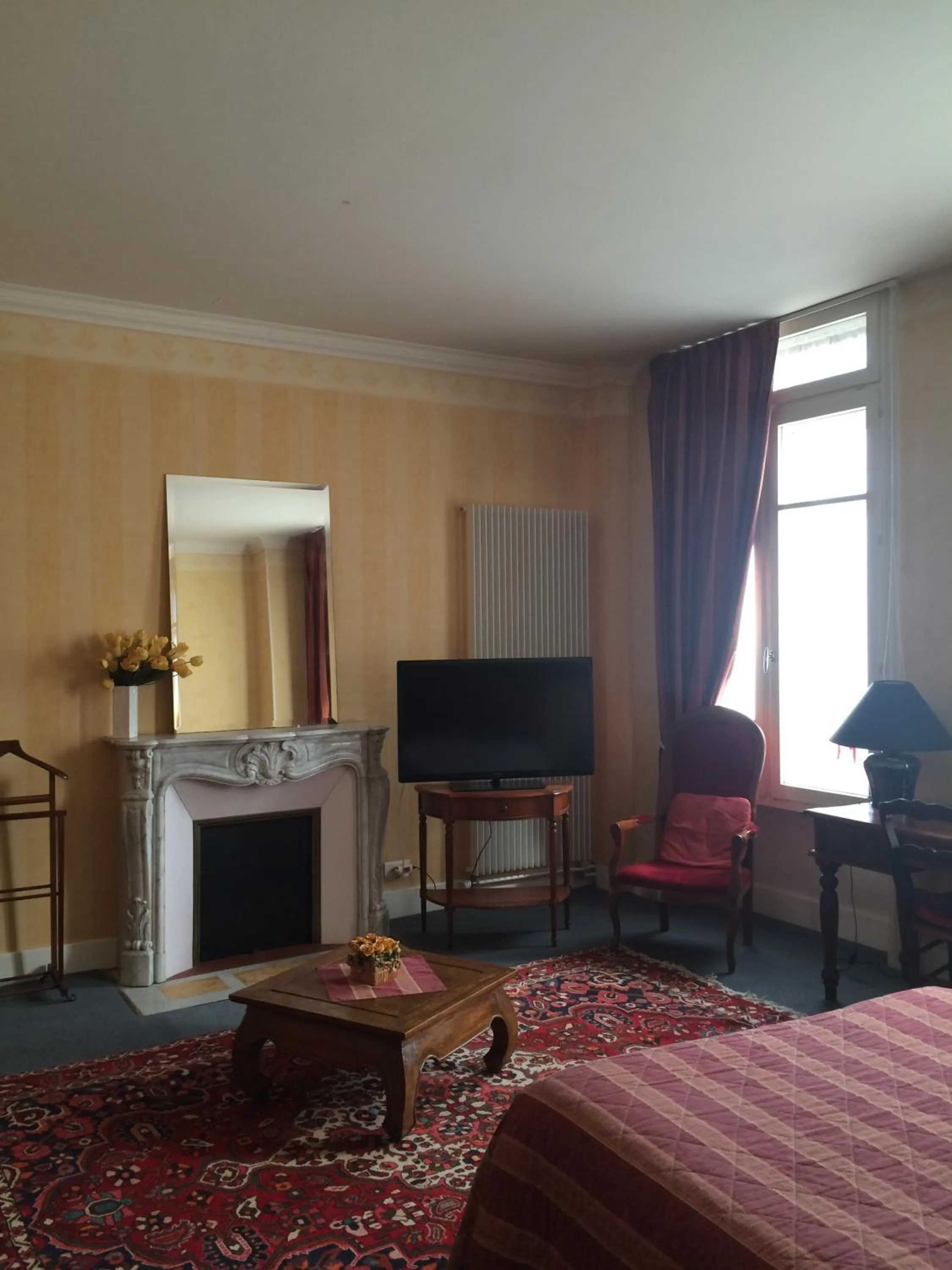 Bedroom in Hôtel De Paris
