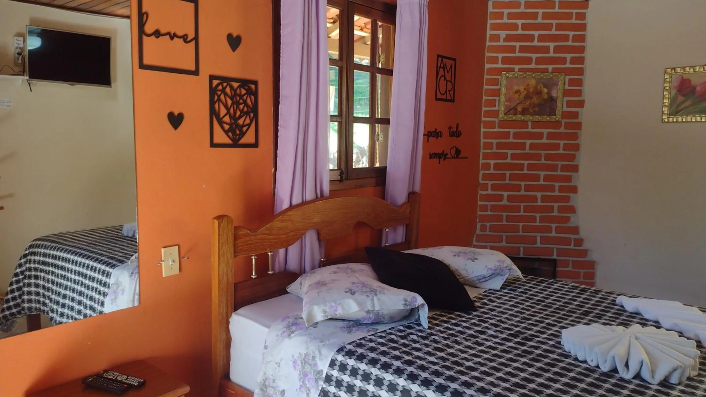 Bed in Pousada Sol Nascente