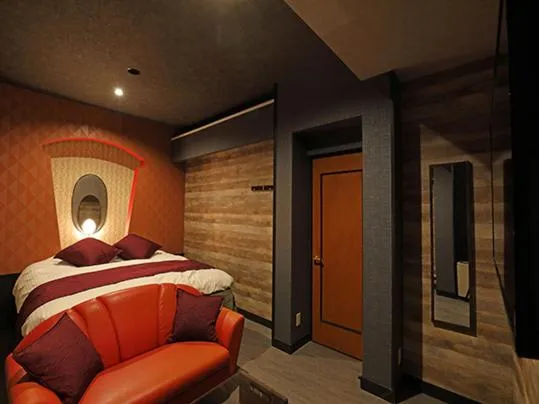 Bed in ホテル マリオン 鈴鹿