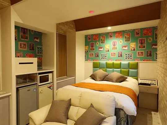 Bed in ホテル マリオン 鈴鹿