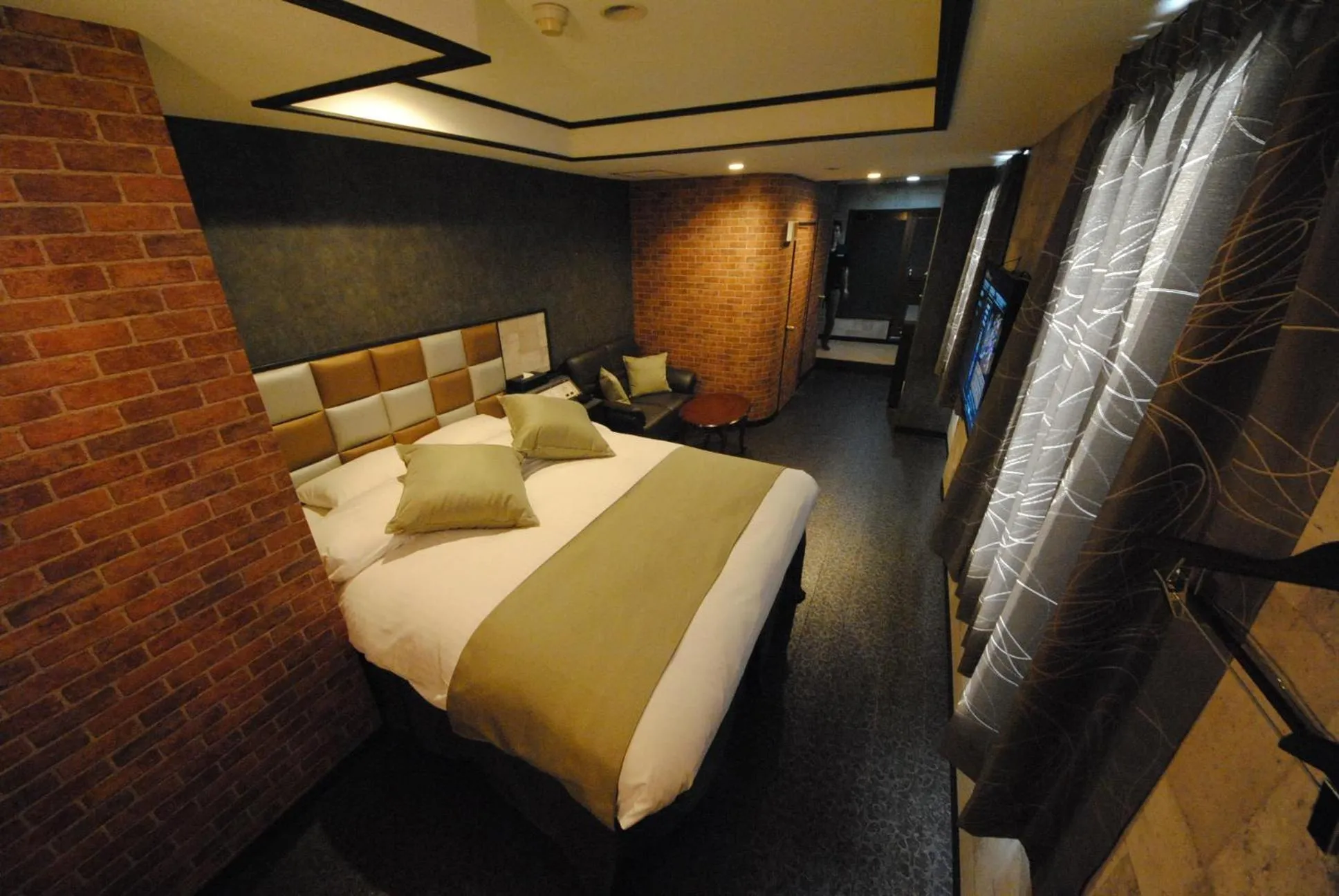 Bed in ホテル マリオン 鈴鹿