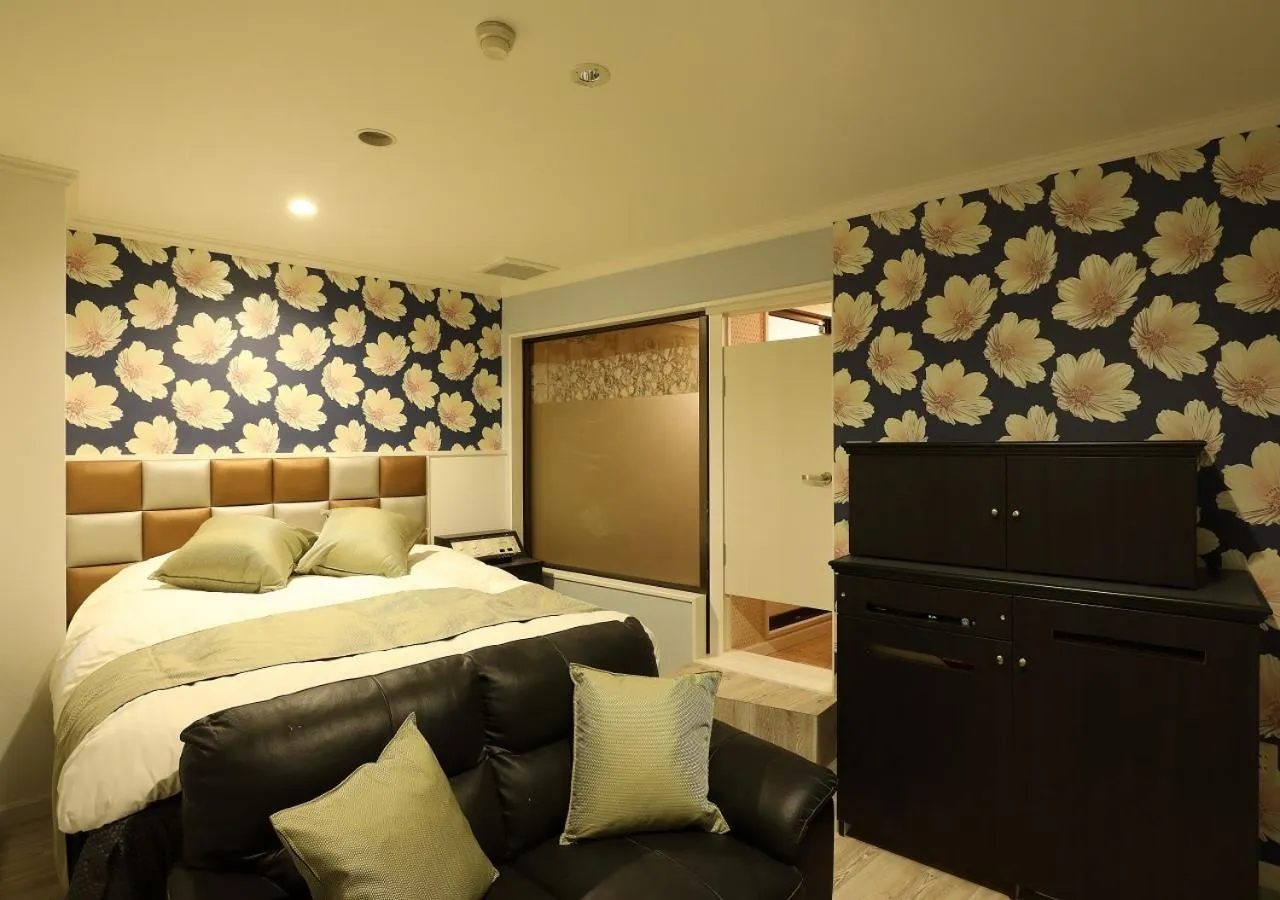 Bed in ホテル マリオン 鈴鹿