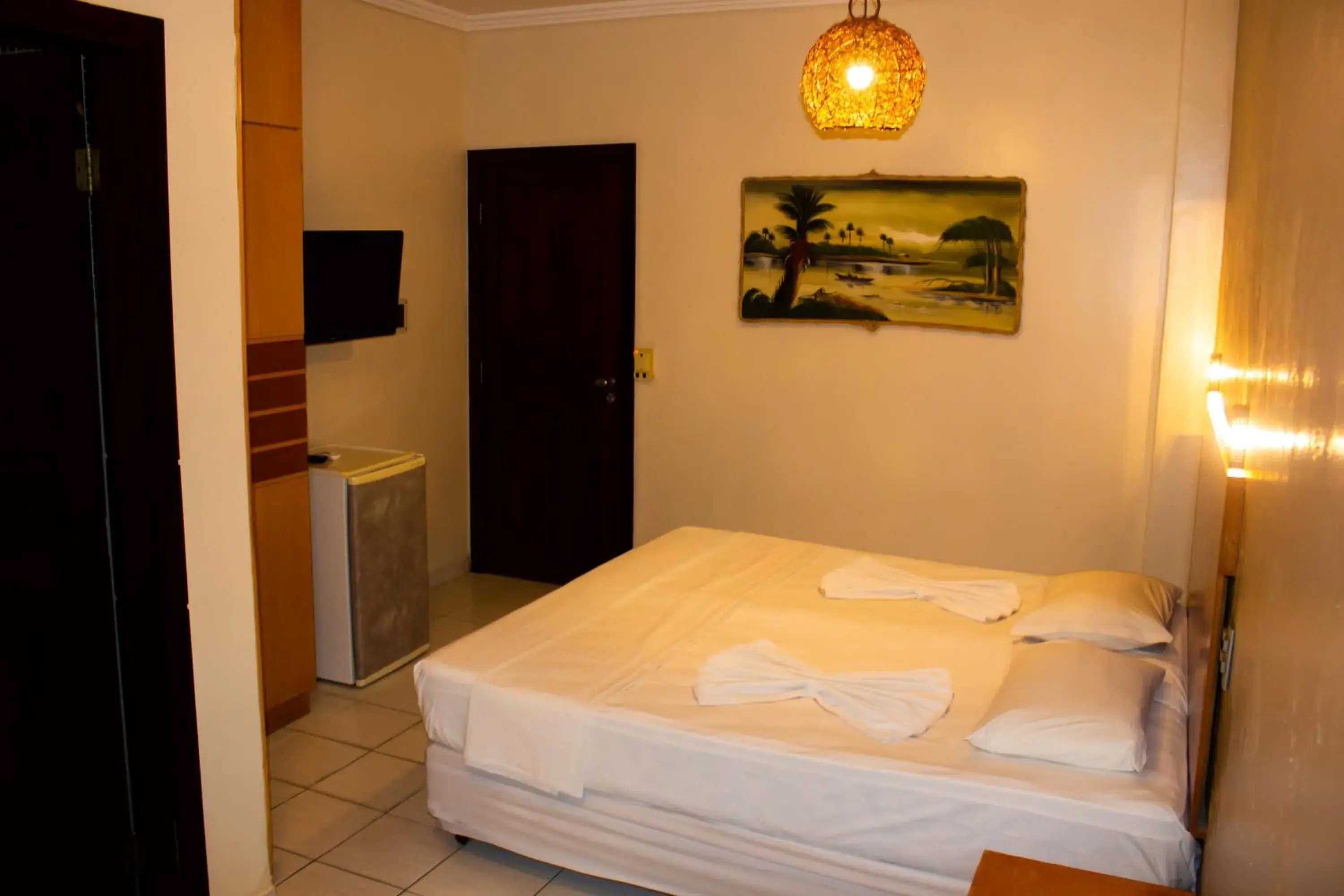 Standard Triple Room in Hotel Pousada Azzurra Standard Triple Room in Hotel Pousada Azzurra