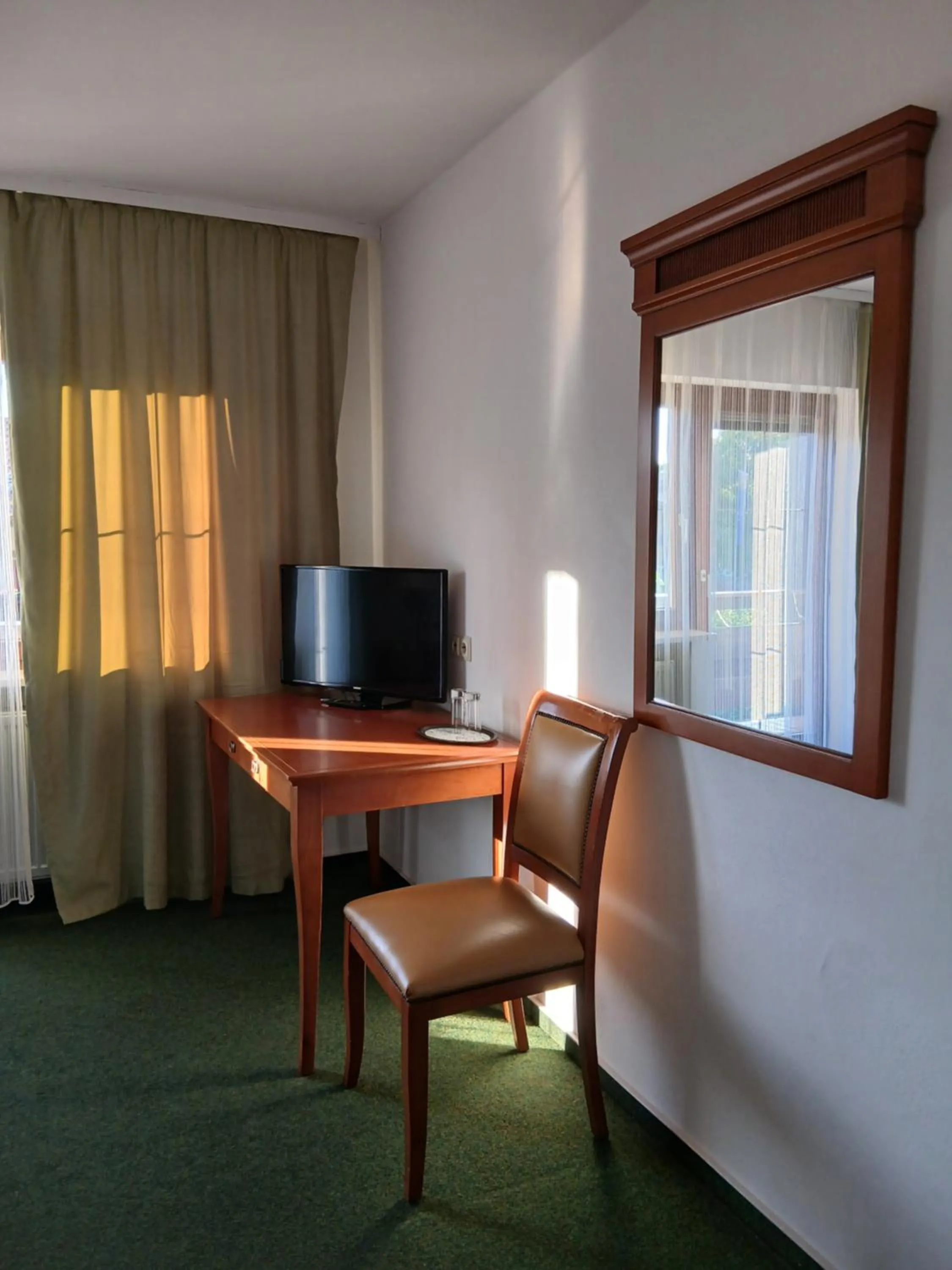 Communal lounge/ TV room in Alpenhotel Gastager