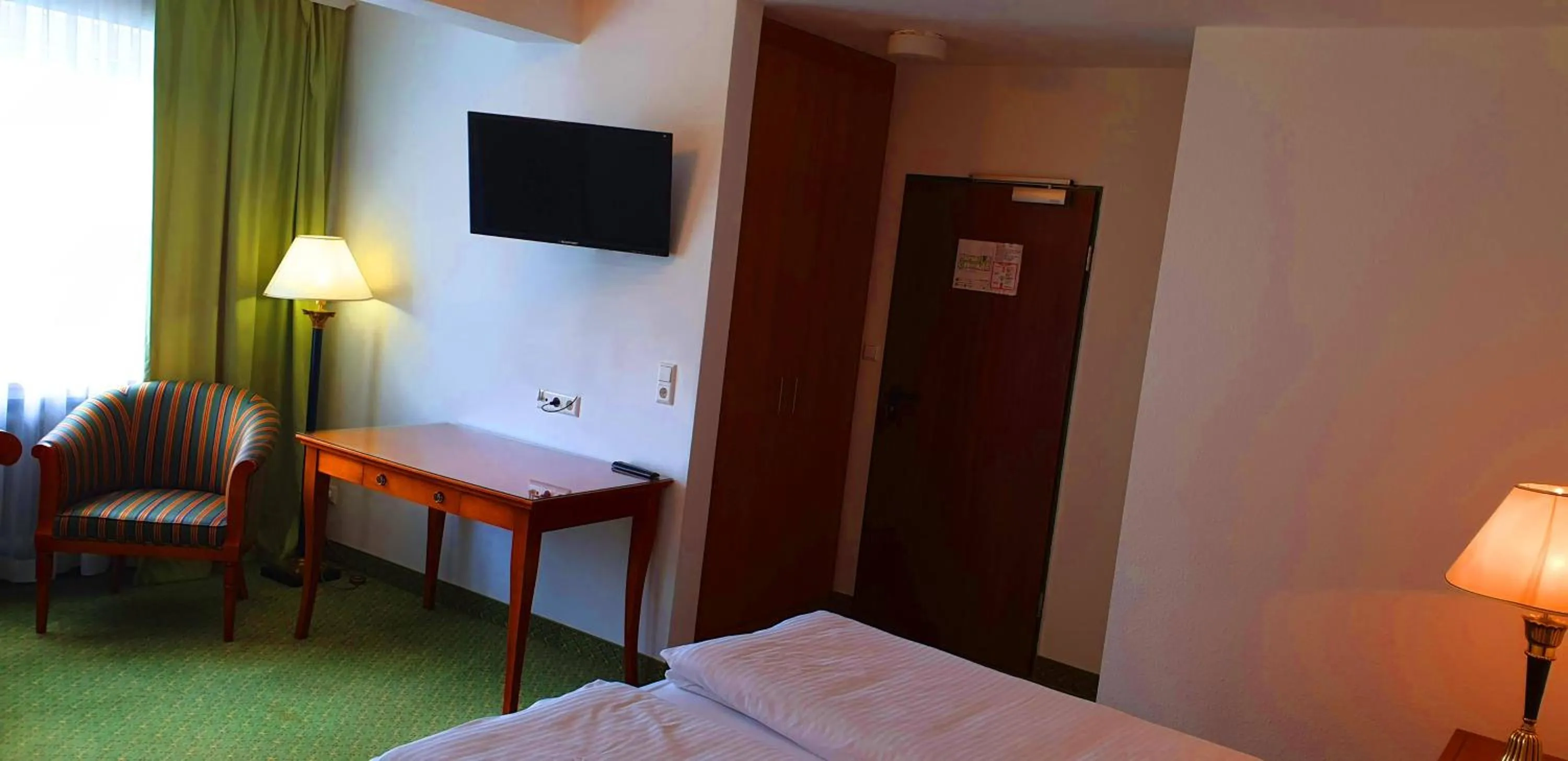 Communal lounge/ TV room, Bed in Alpenhotel Gastager