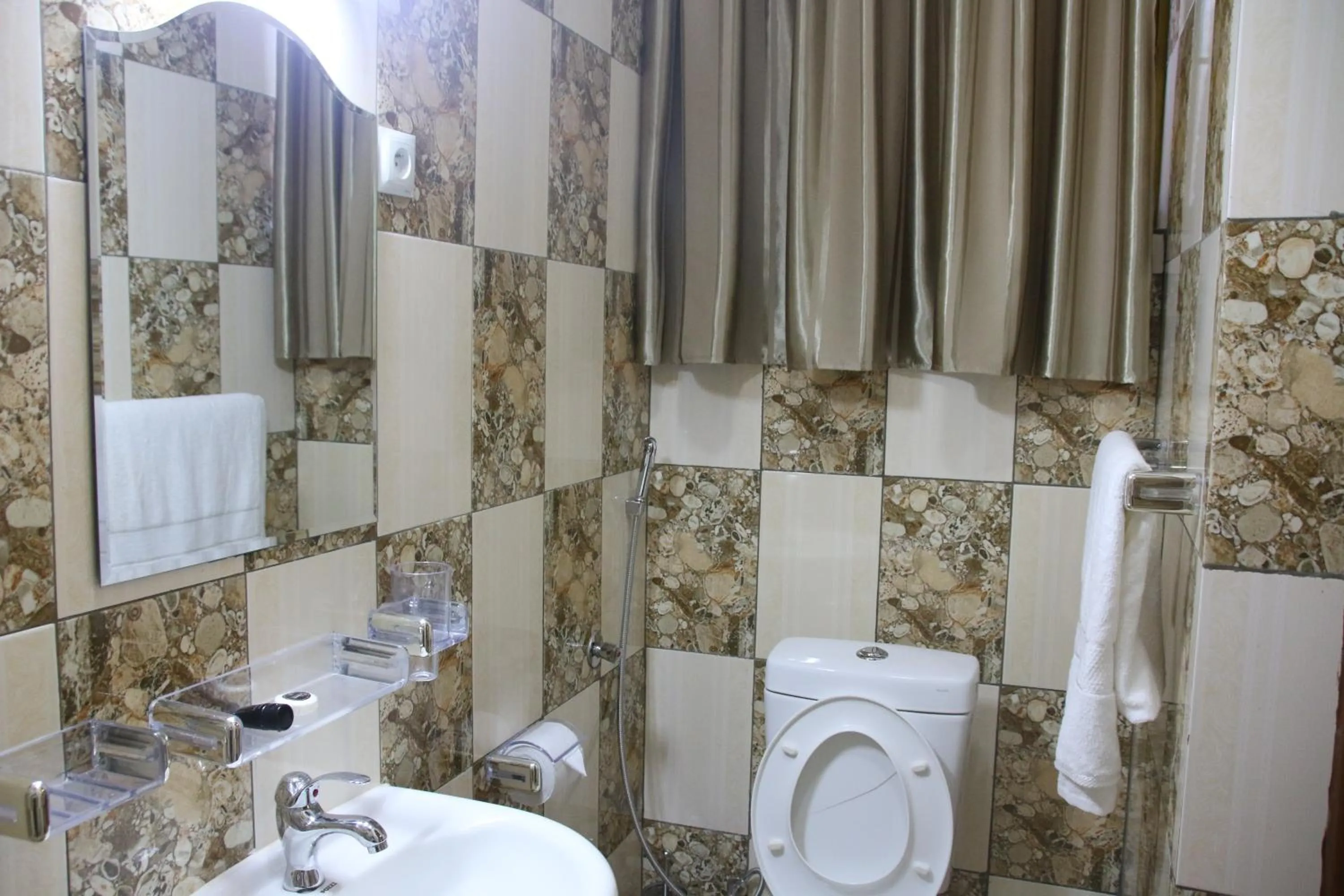 Bathroom in Anthurium Residential Hotel