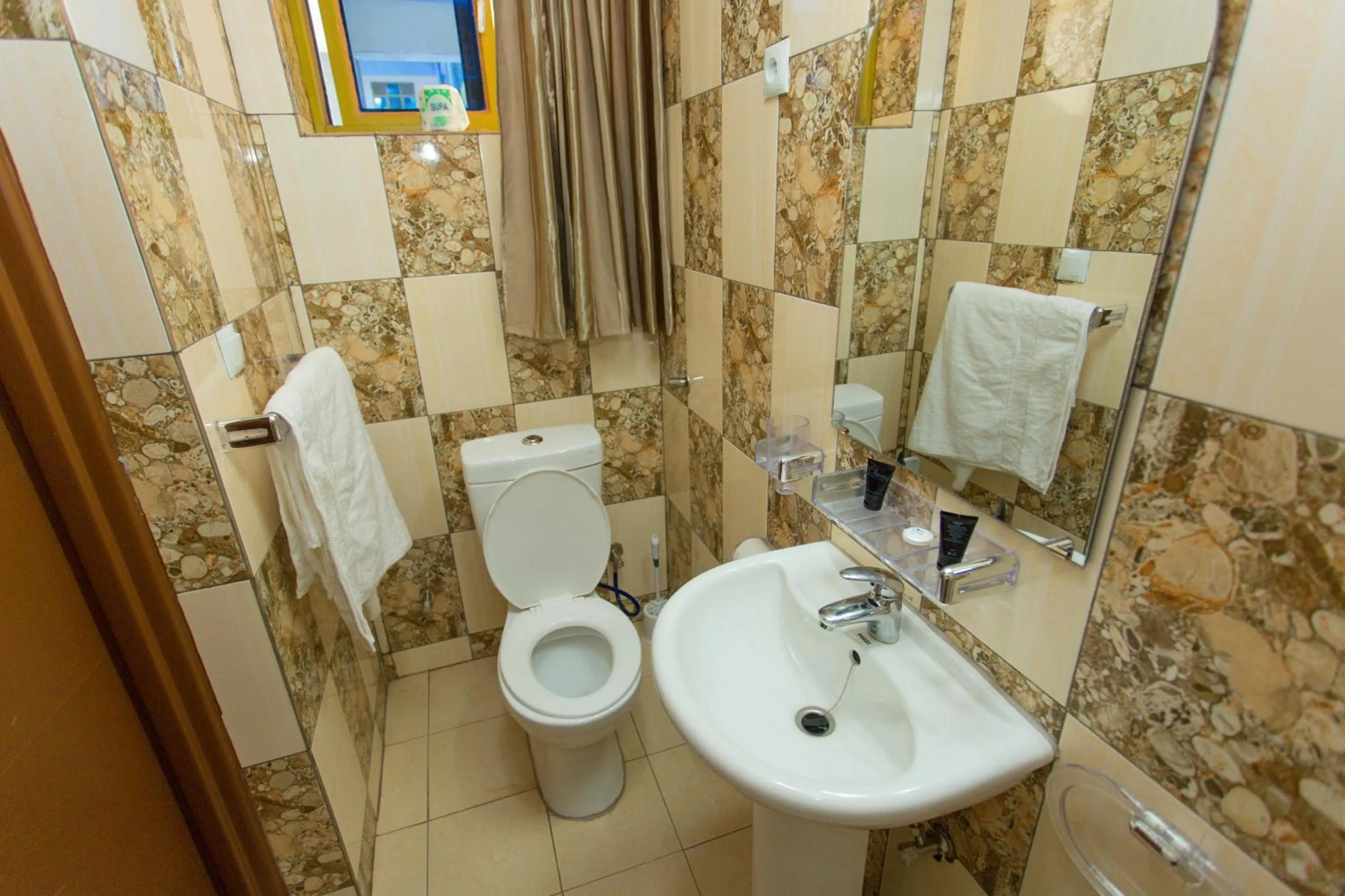 Shower in Anthurium Residential Hotel