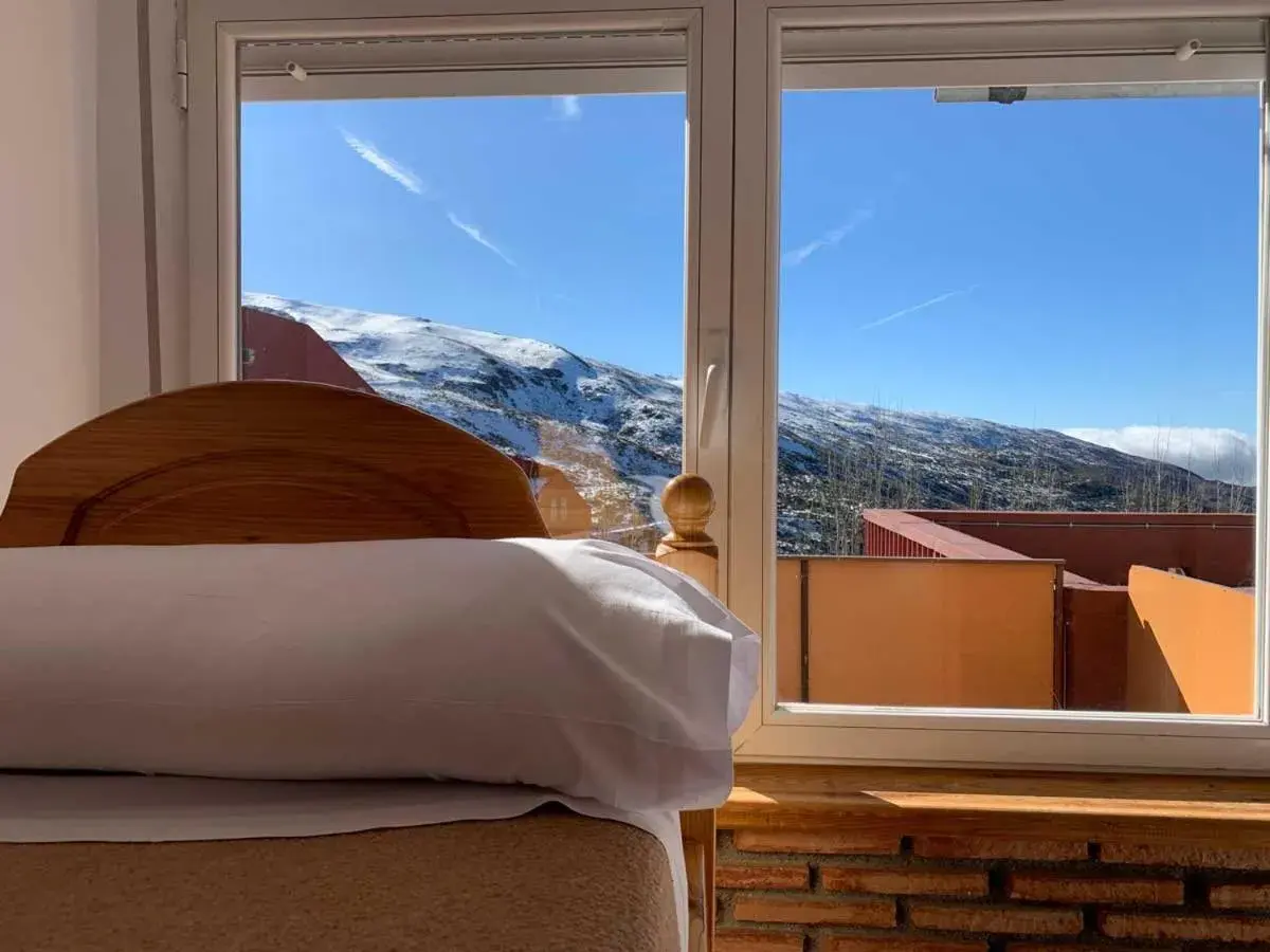 Bed in Apartamentos Bulgaria Bed in Apartamentos Bulgaria