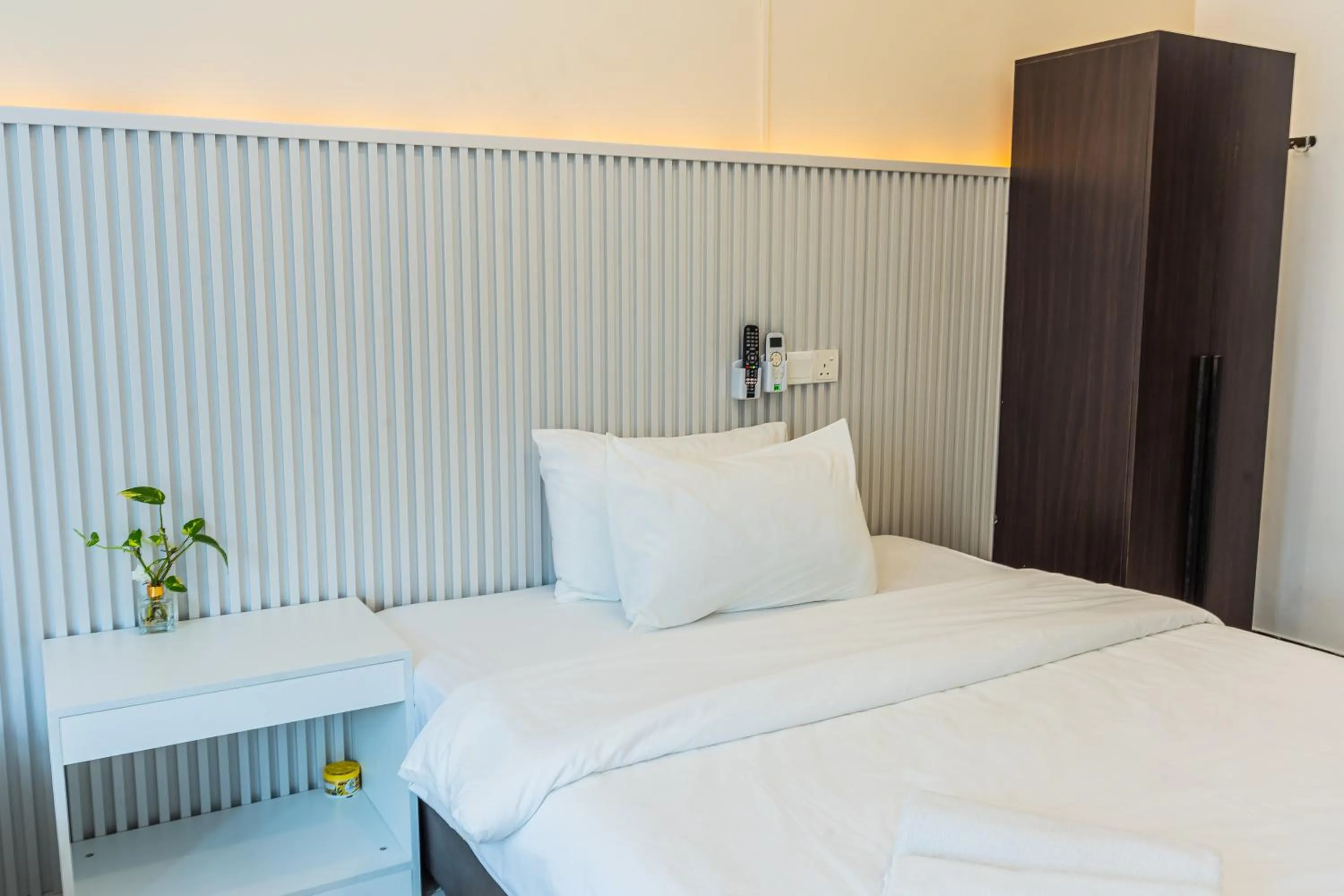 Bed in Ihome Boutique Hotel