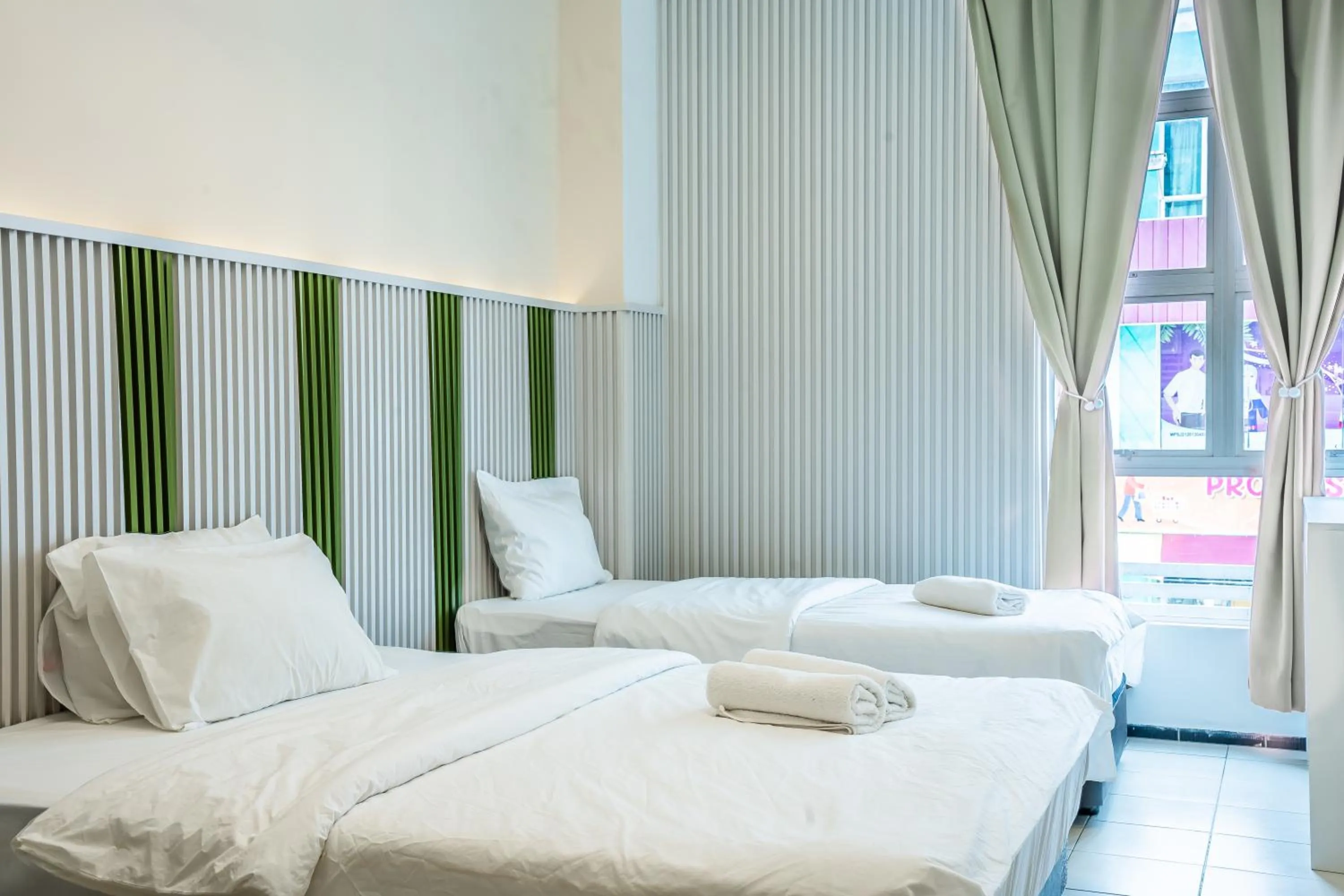 Bed in Ihome Boutique Hotel