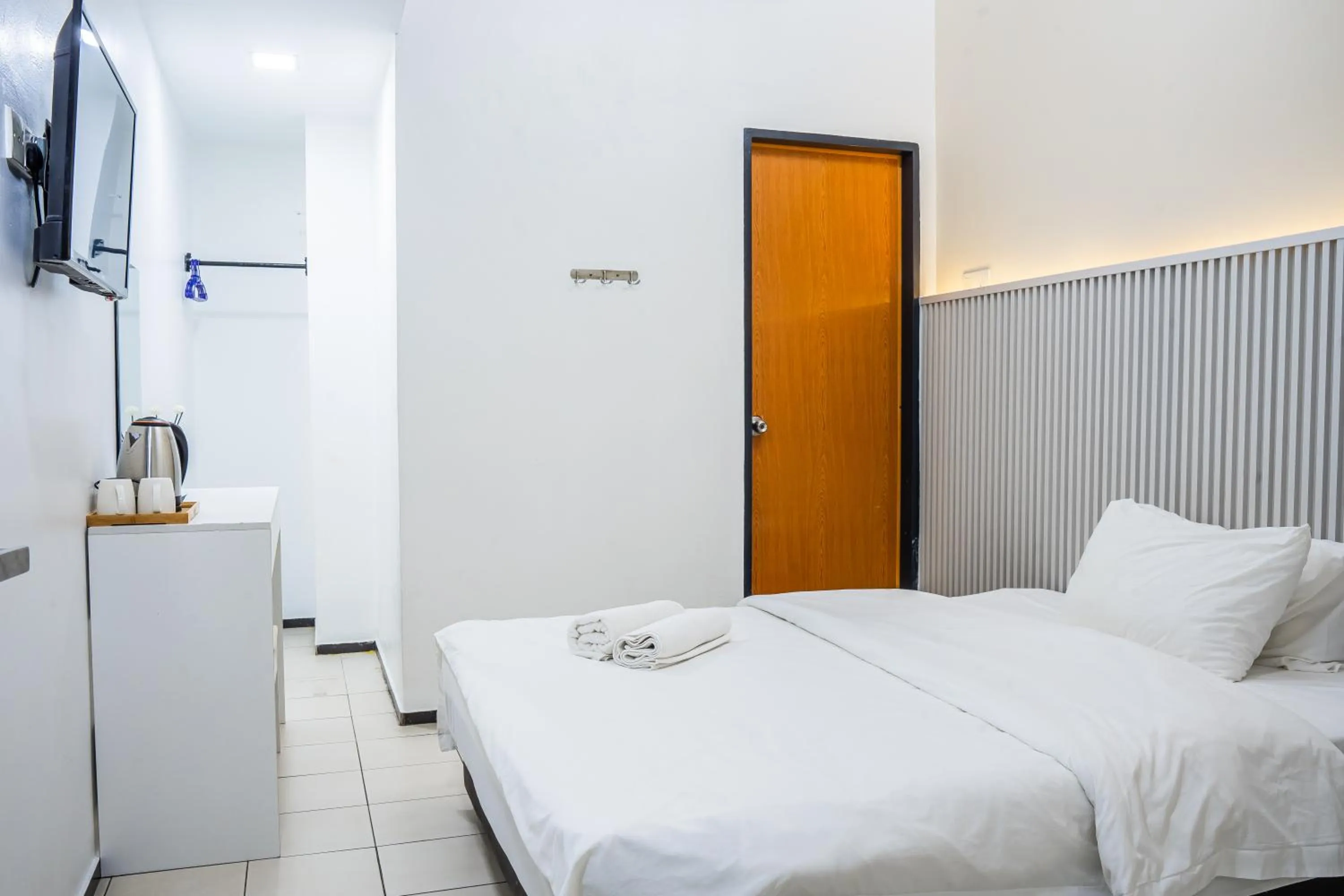 Bed in Ihome Boutique Hotel