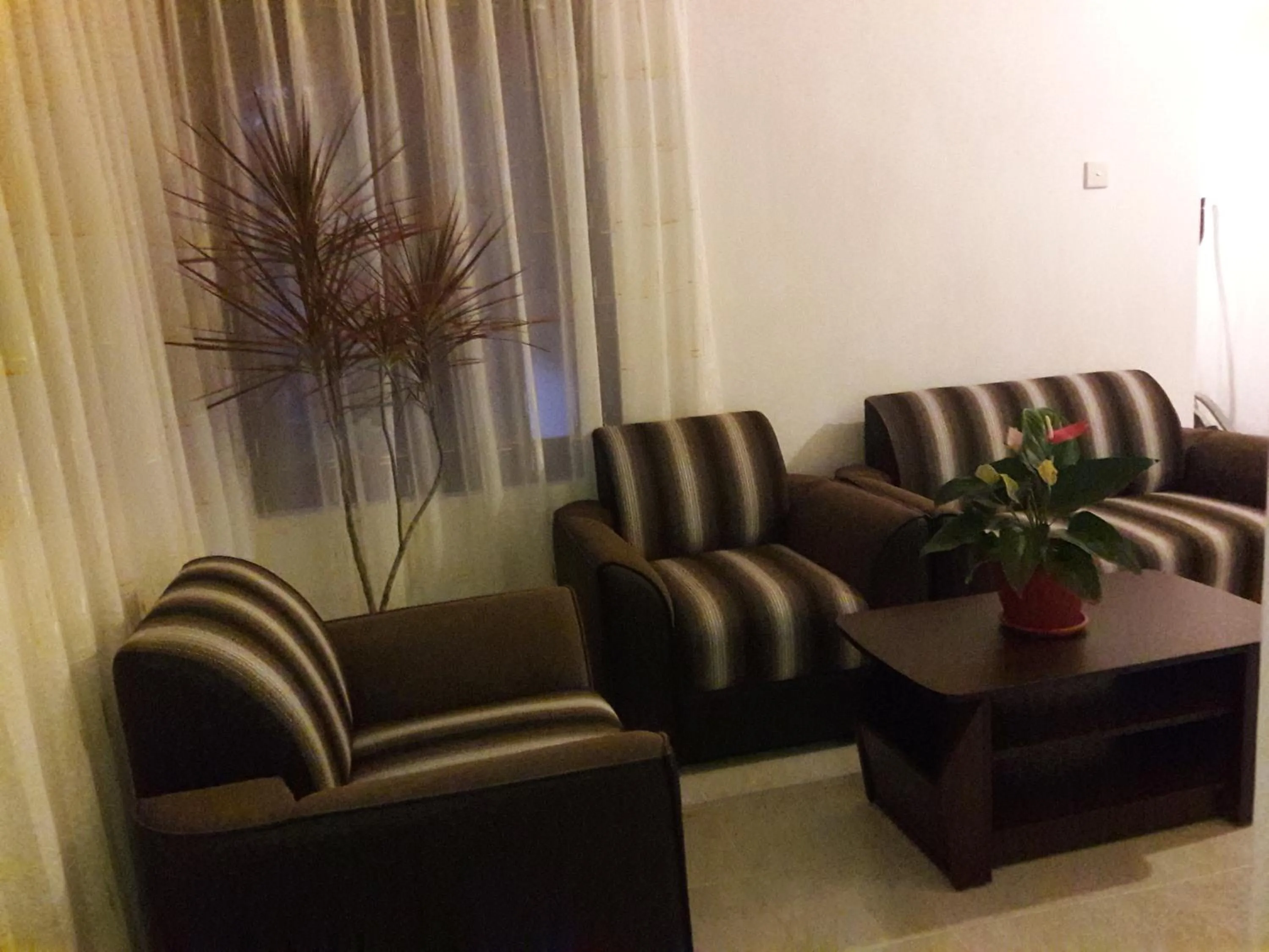 Communal lounge/ TV room in Sisanda Residence