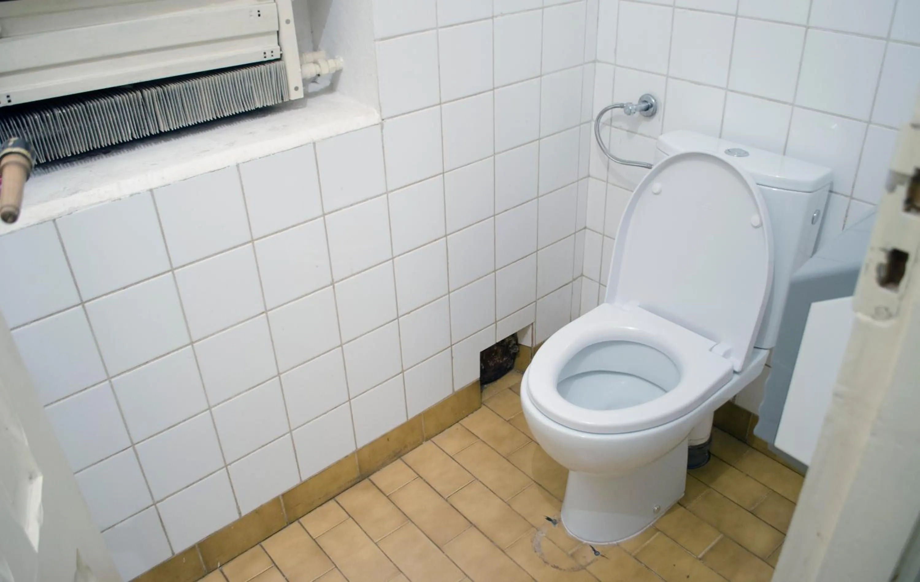 Toilet in Red Nose Hostel with Self-Check In