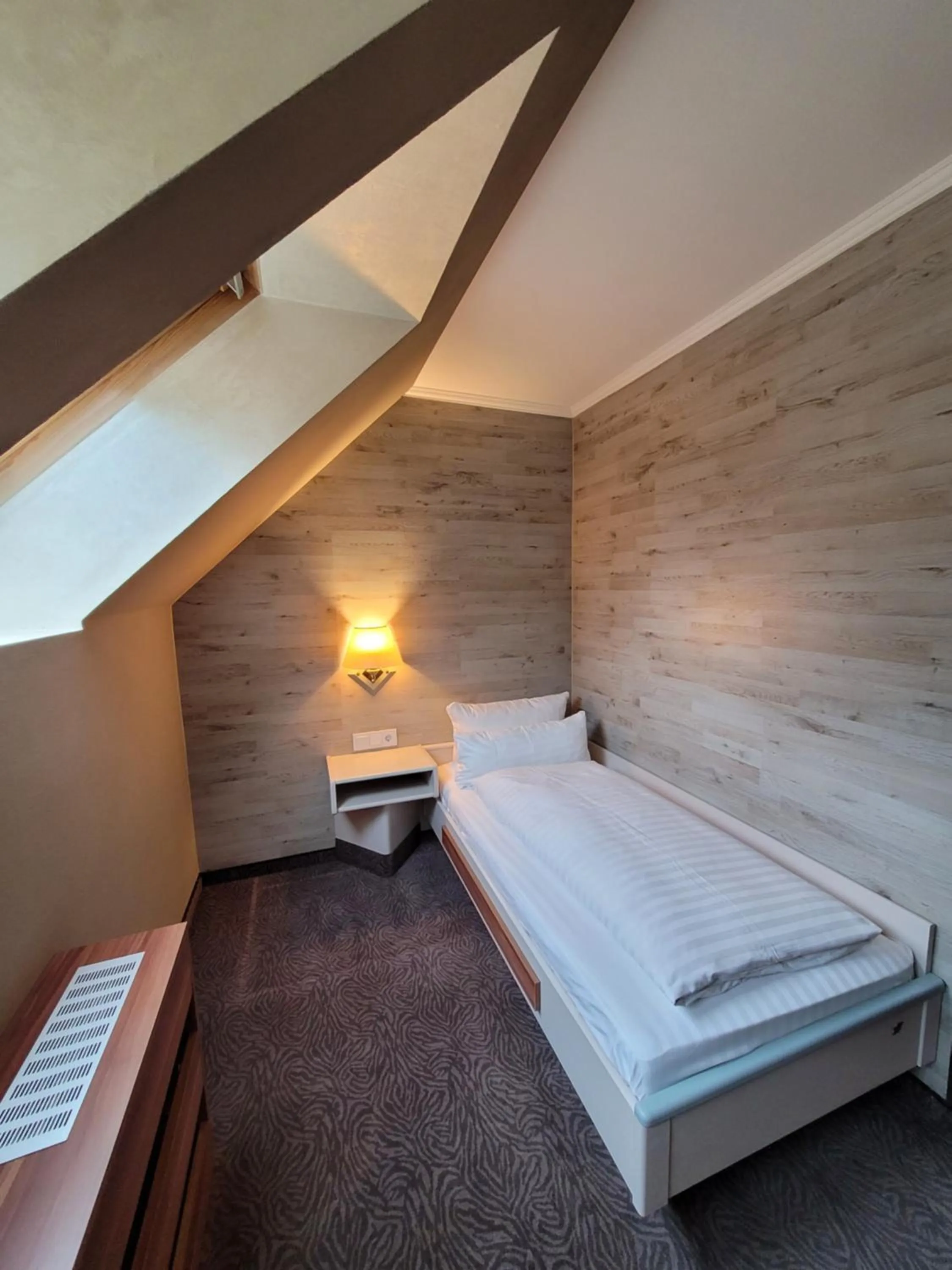 Bed in Ambiente Hotel garni