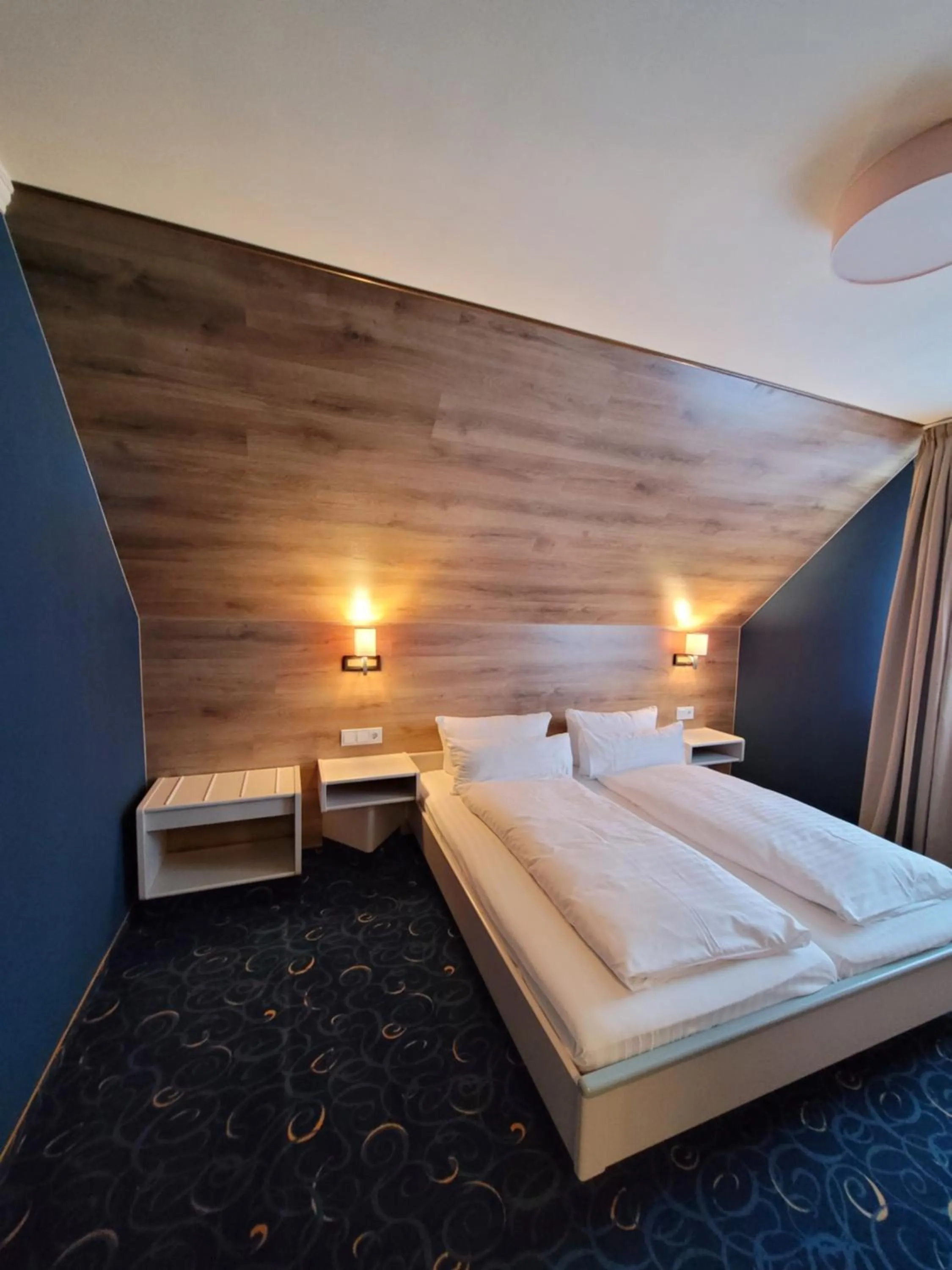Bed in Ambiente Hotel garni