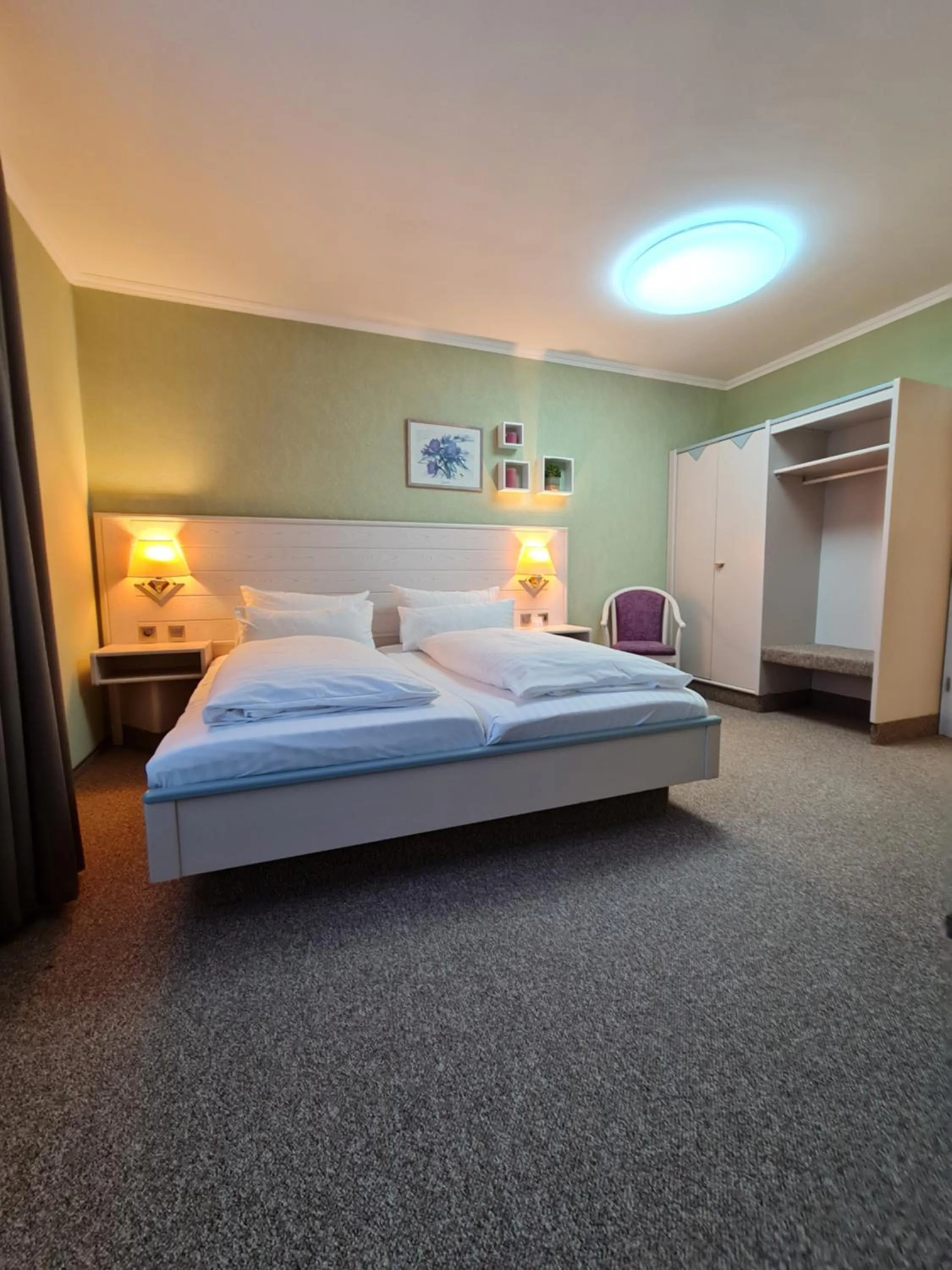 Bed in Ambiente Hotel garni