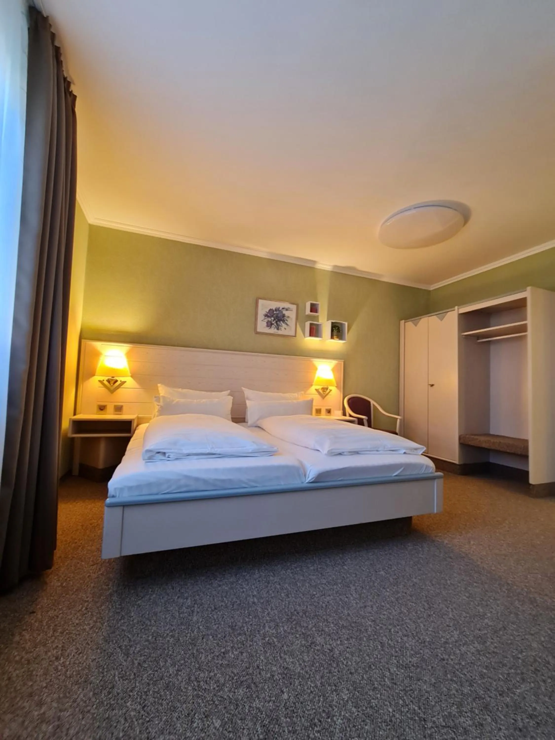 Bed in Ambiente Hotel garni