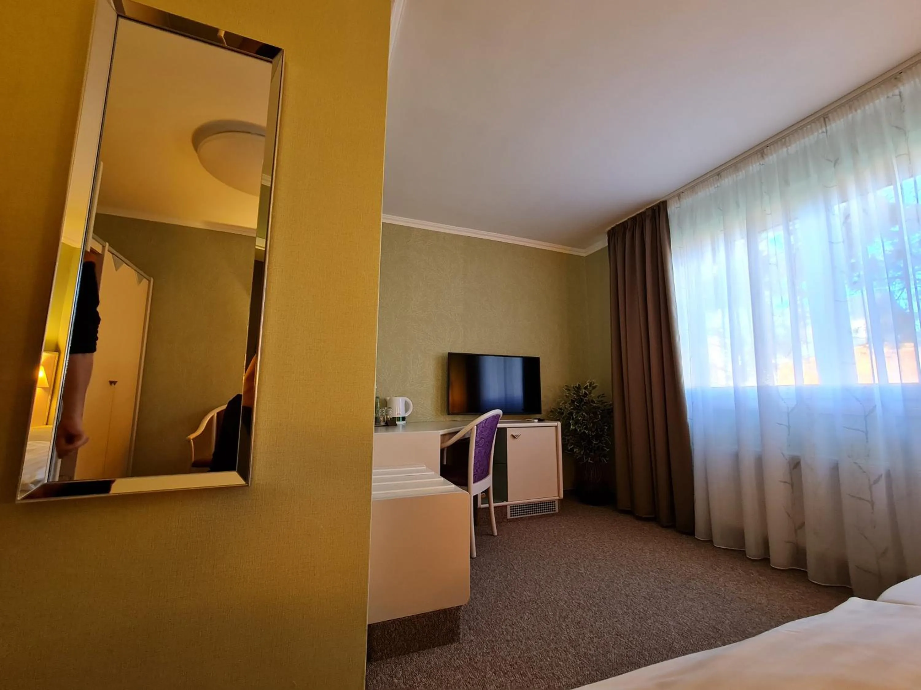 Bed in Ambiente Hotel garni