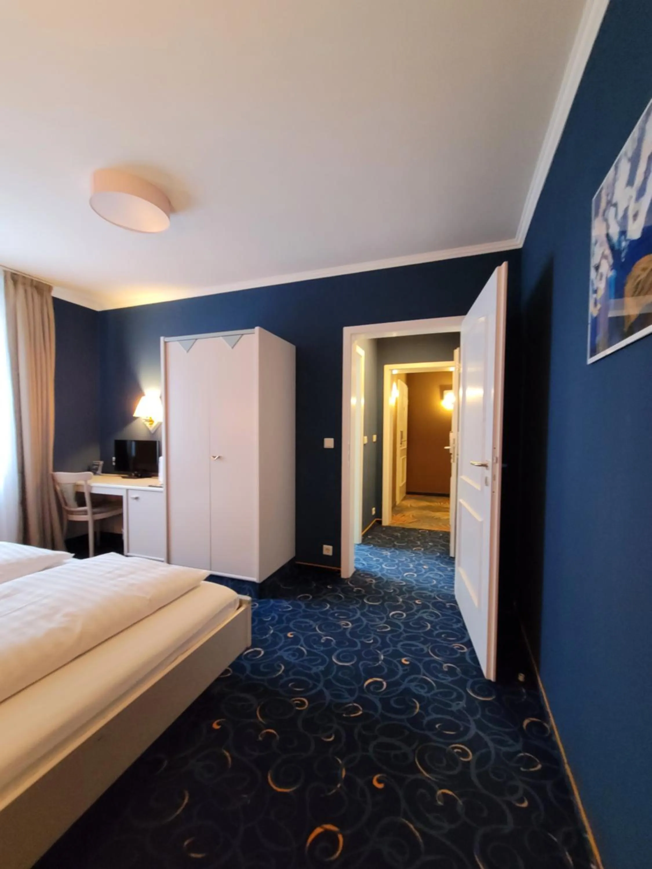 Bed in Ambiente Hotel garni