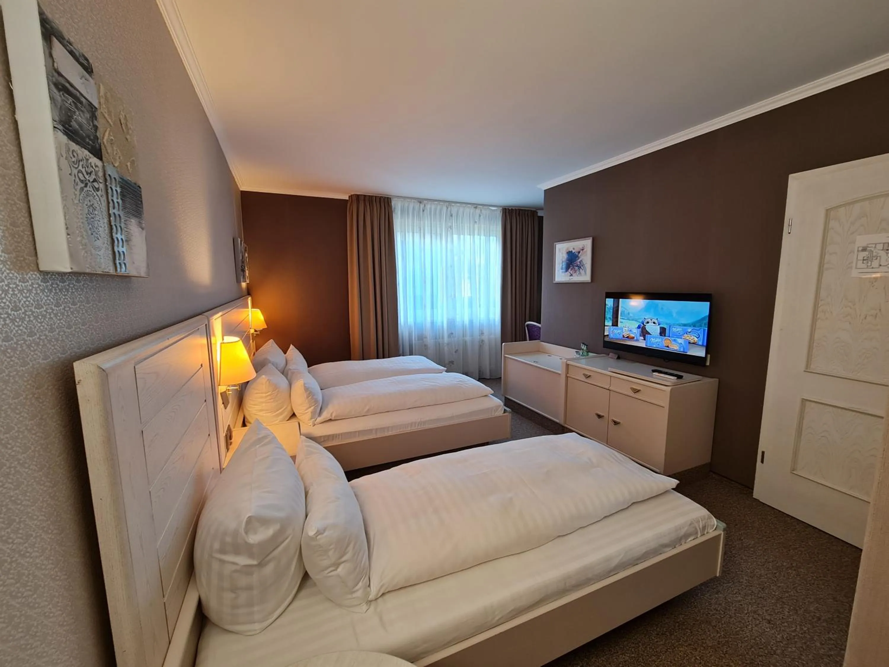 Bed in Ambiente Hotel garni