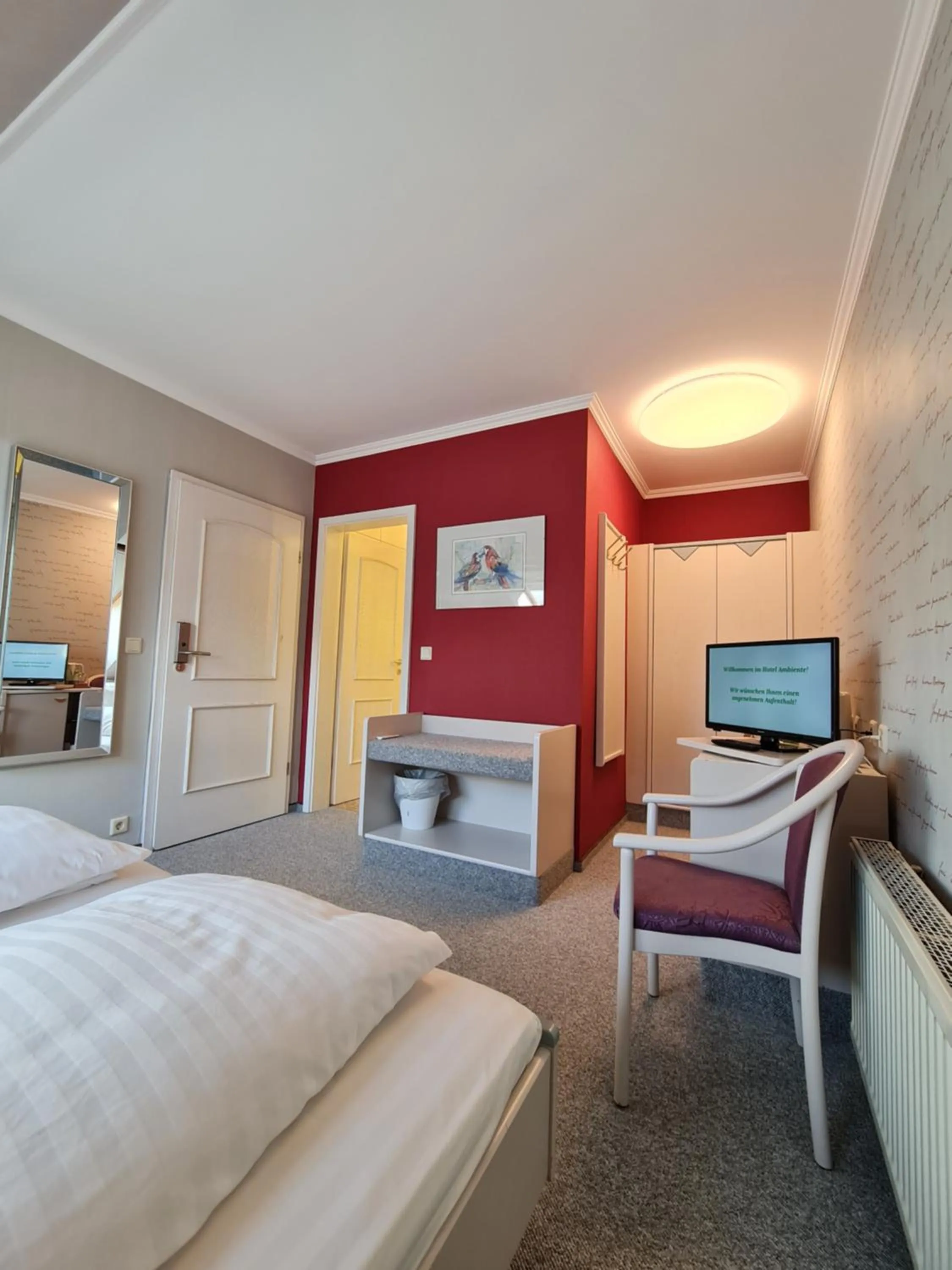 Bed in Ambiente Hotel garni