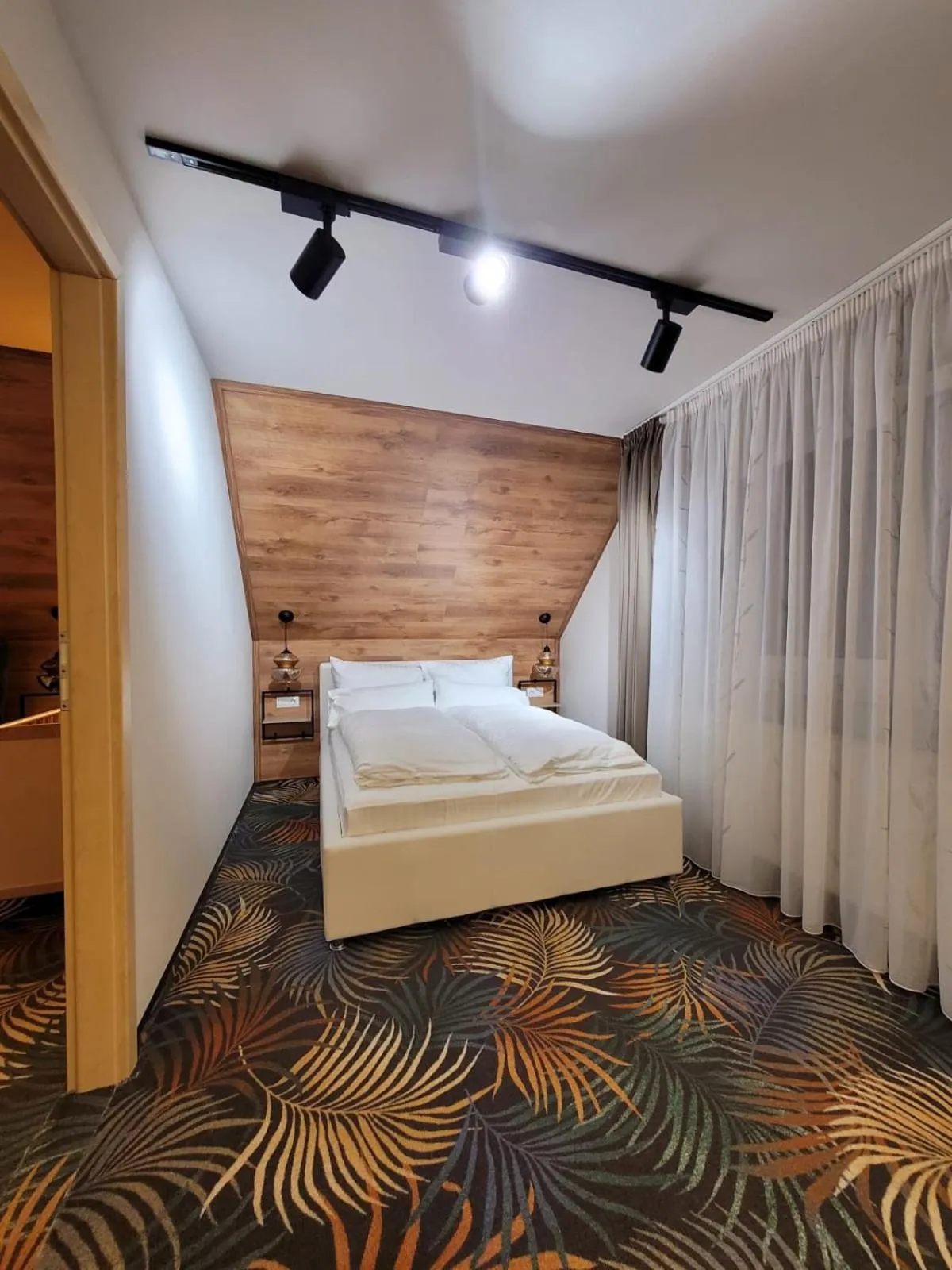 Bed in Ambiente Hotel garni