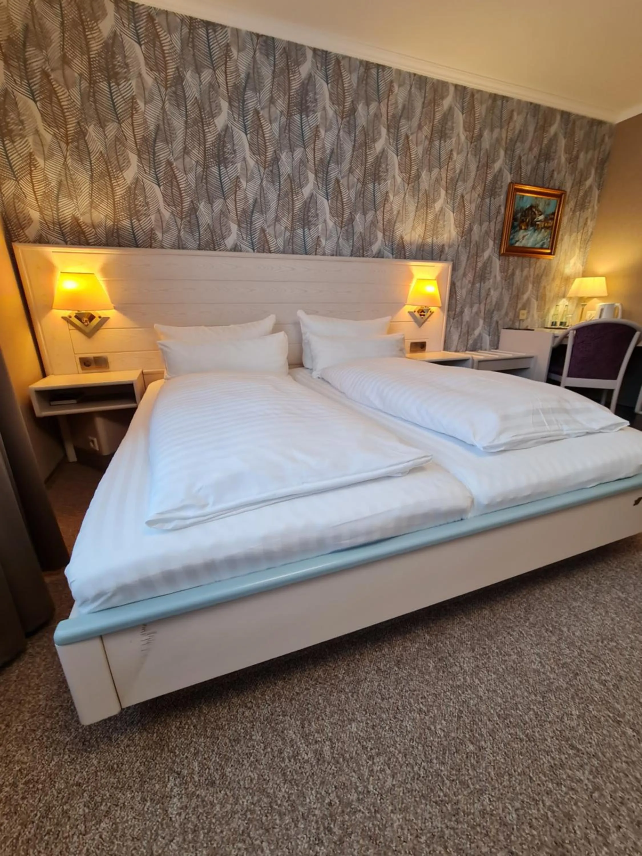 Bed in Ambiente Hotel garni