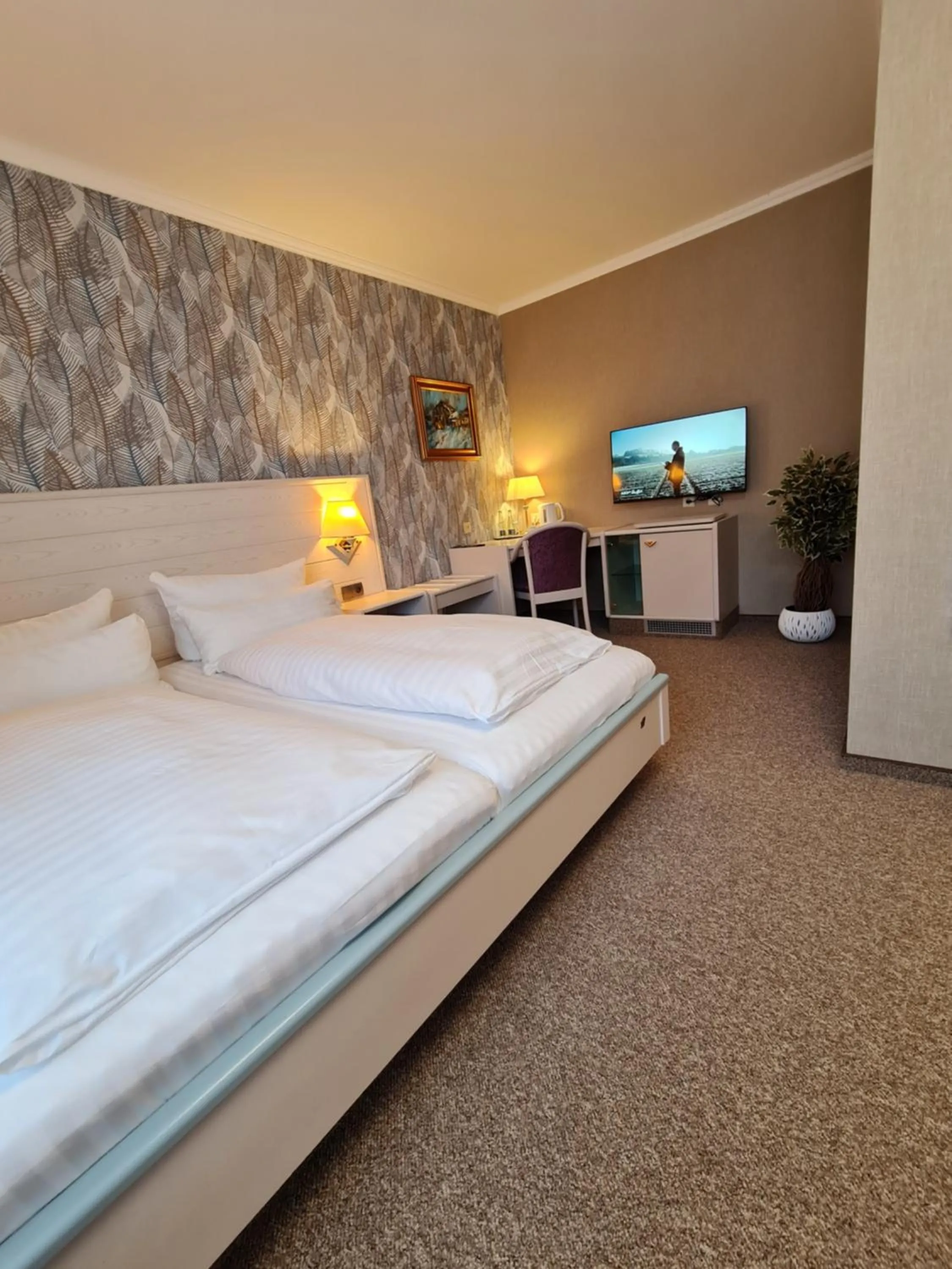 Bed in Ambiente Hotel garni