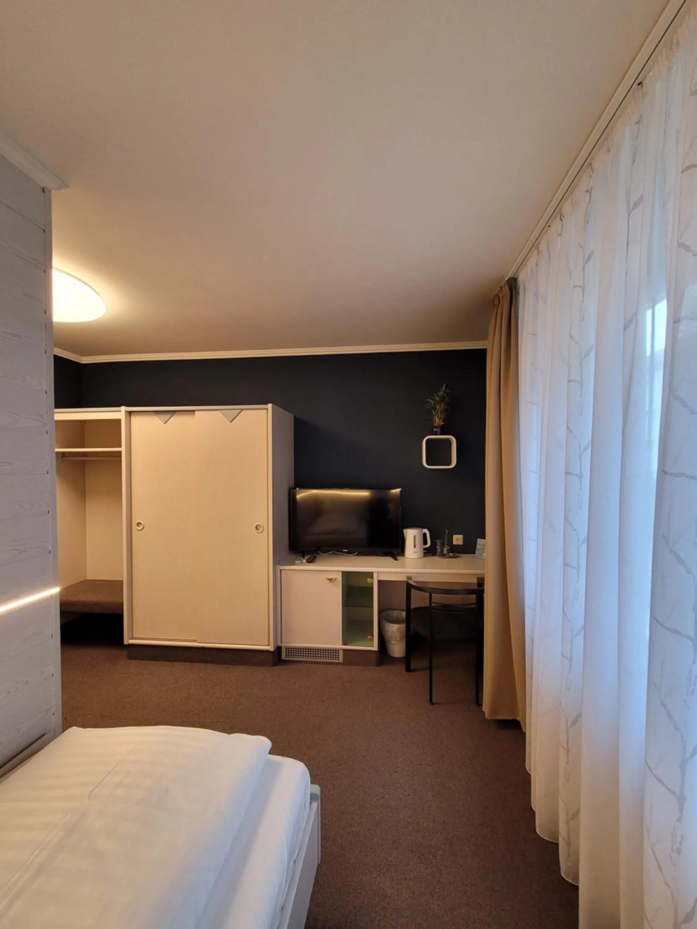 Bed in Ambiente Hotel garni