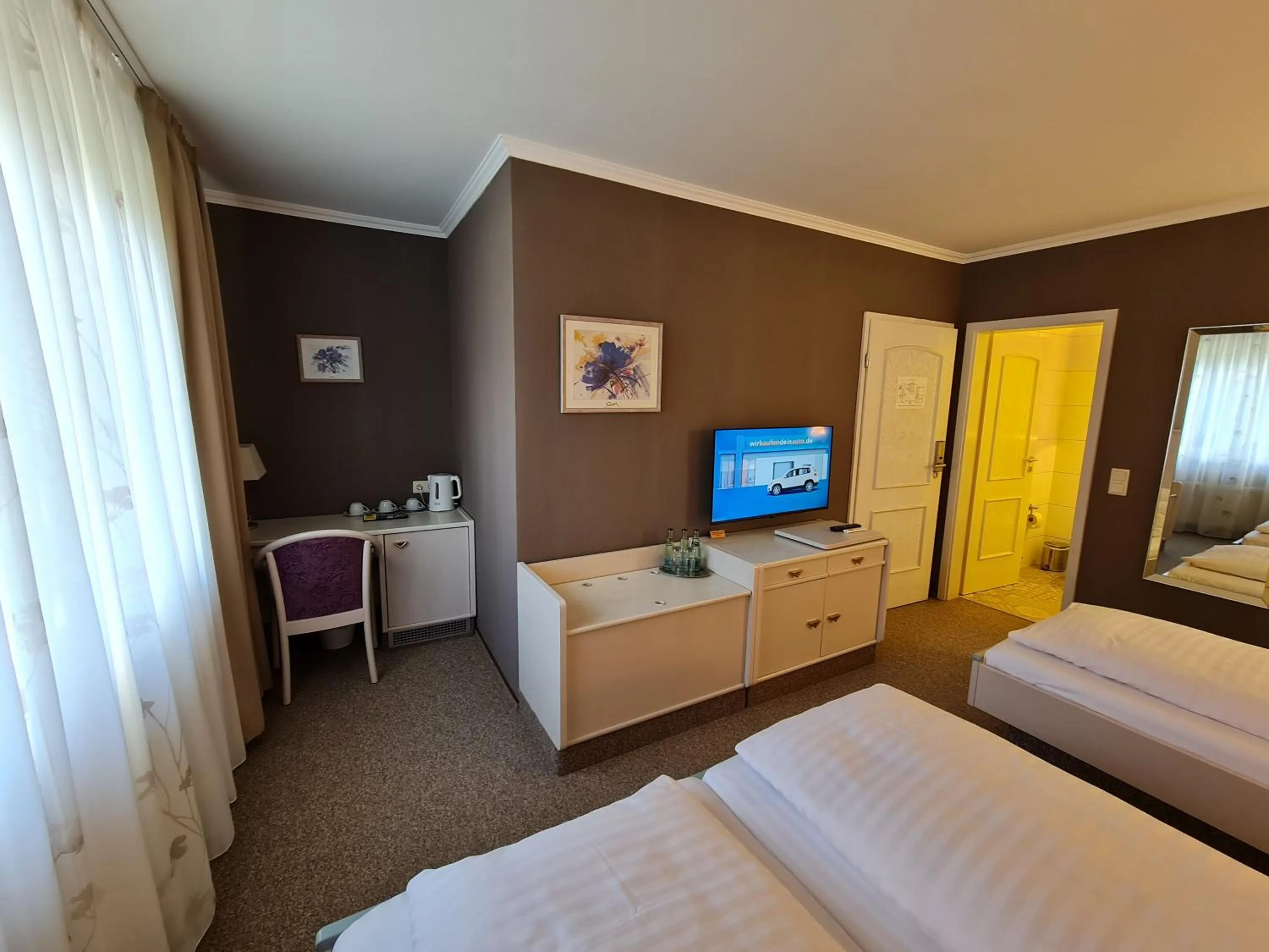 Bed in Ambiente Hotel garni