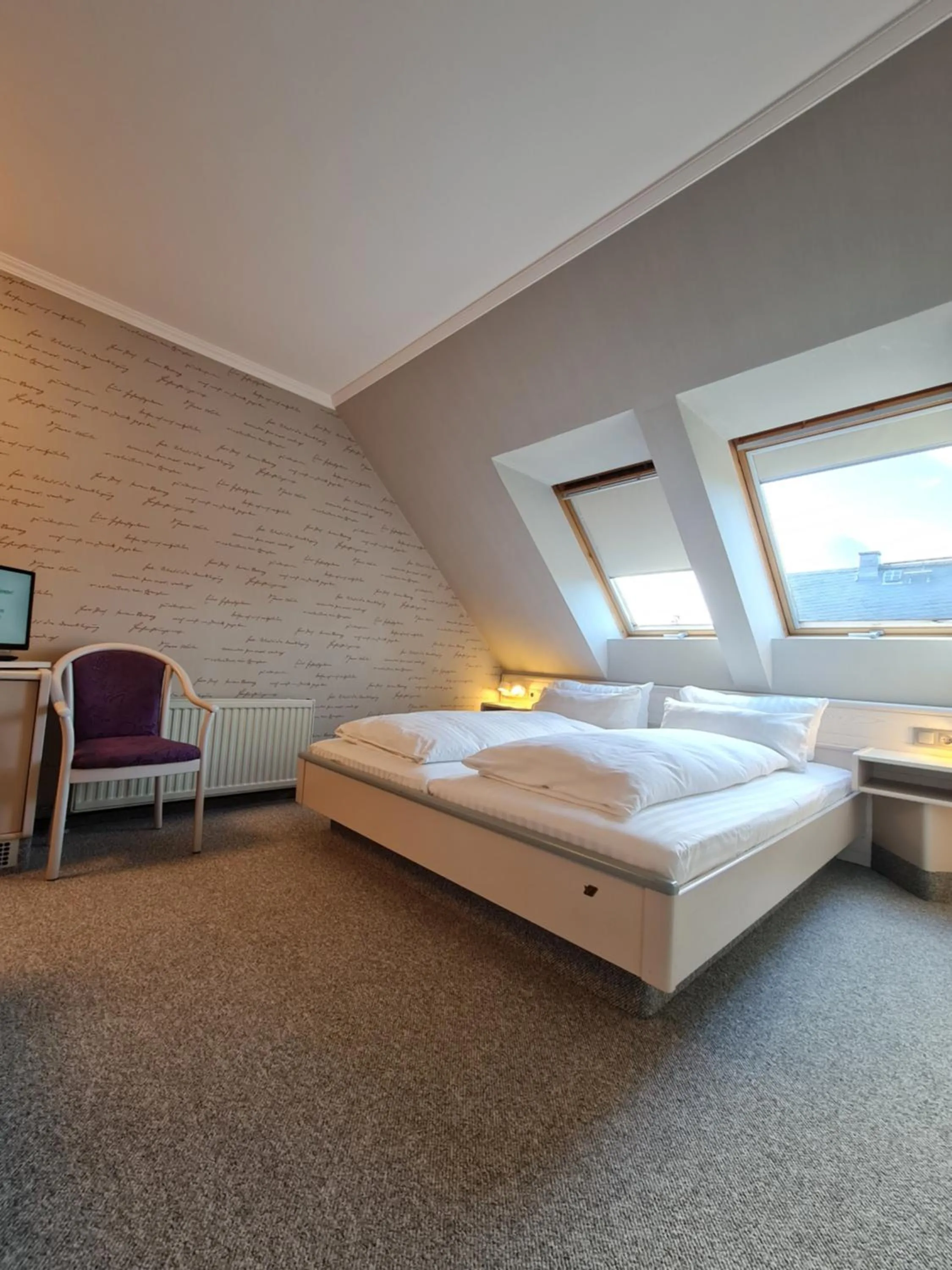 Bed in Ambiente Hotel garni