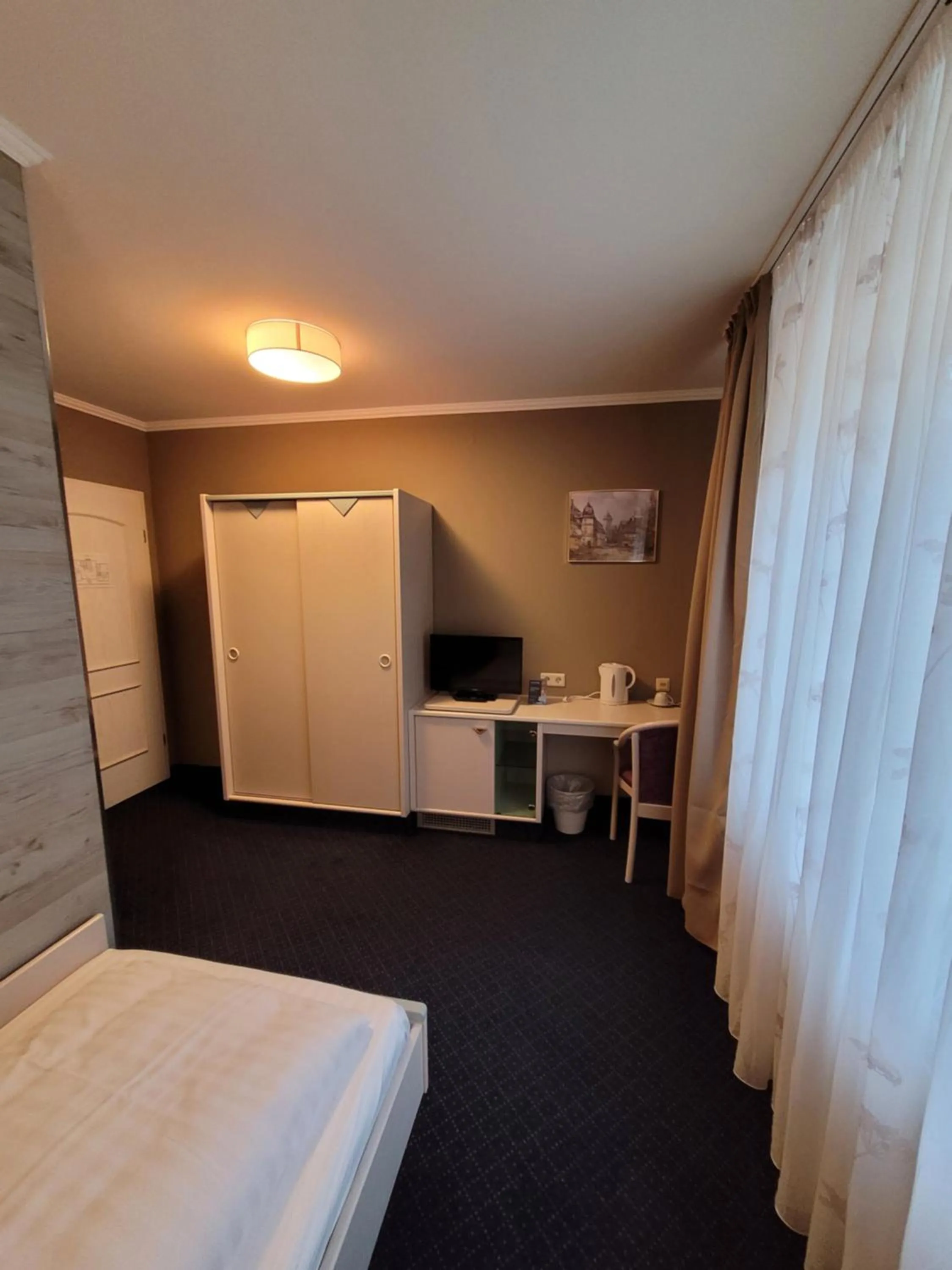 Bed in Ambiente Hotel garni