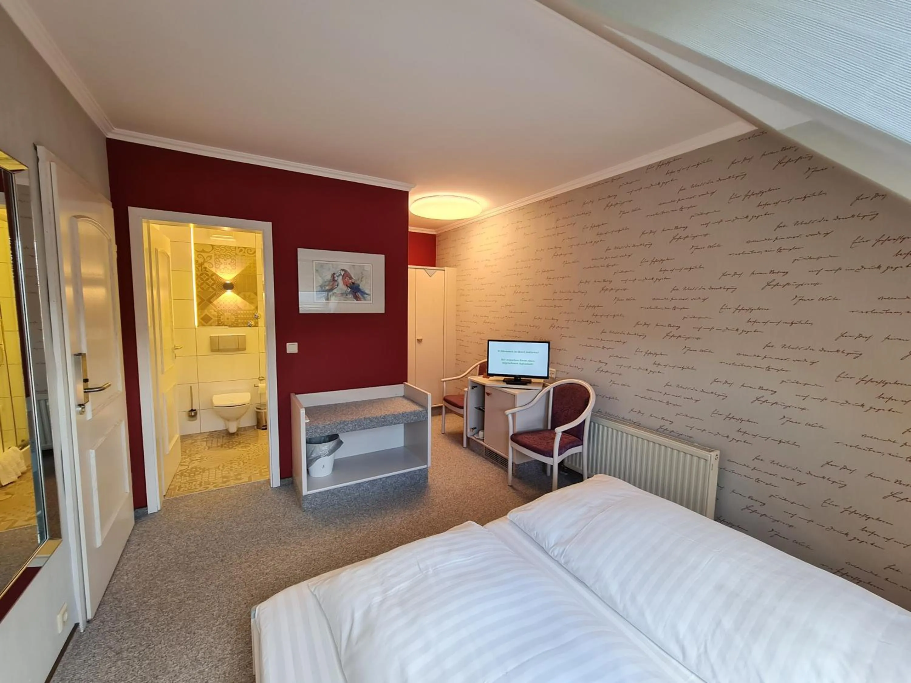 Bed in Ambiente Hotel garni