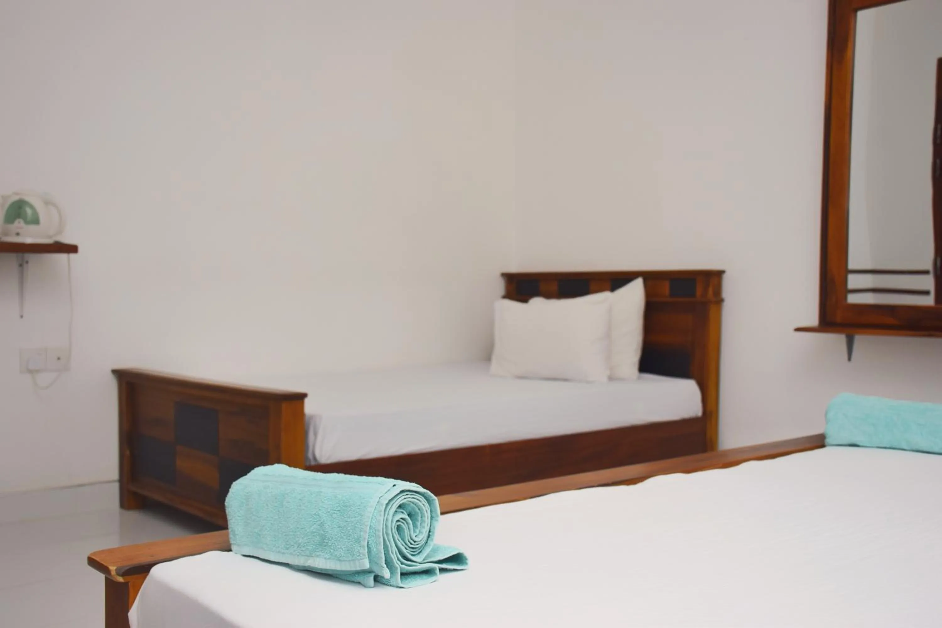 Bed in Sunrise Cottage