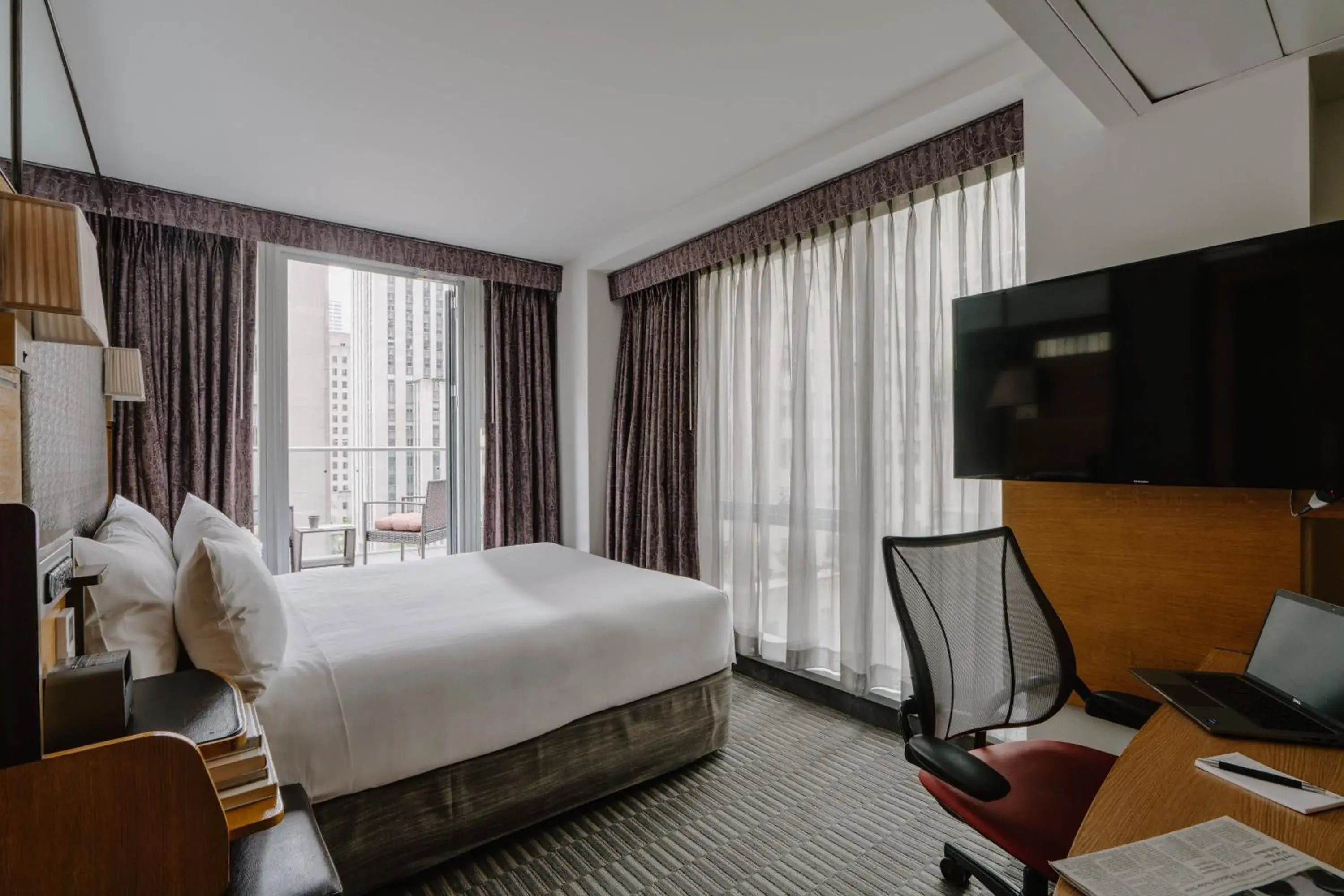 Bed in The Jewel Hotel, New York Bed in The Jewel Hotel, New York