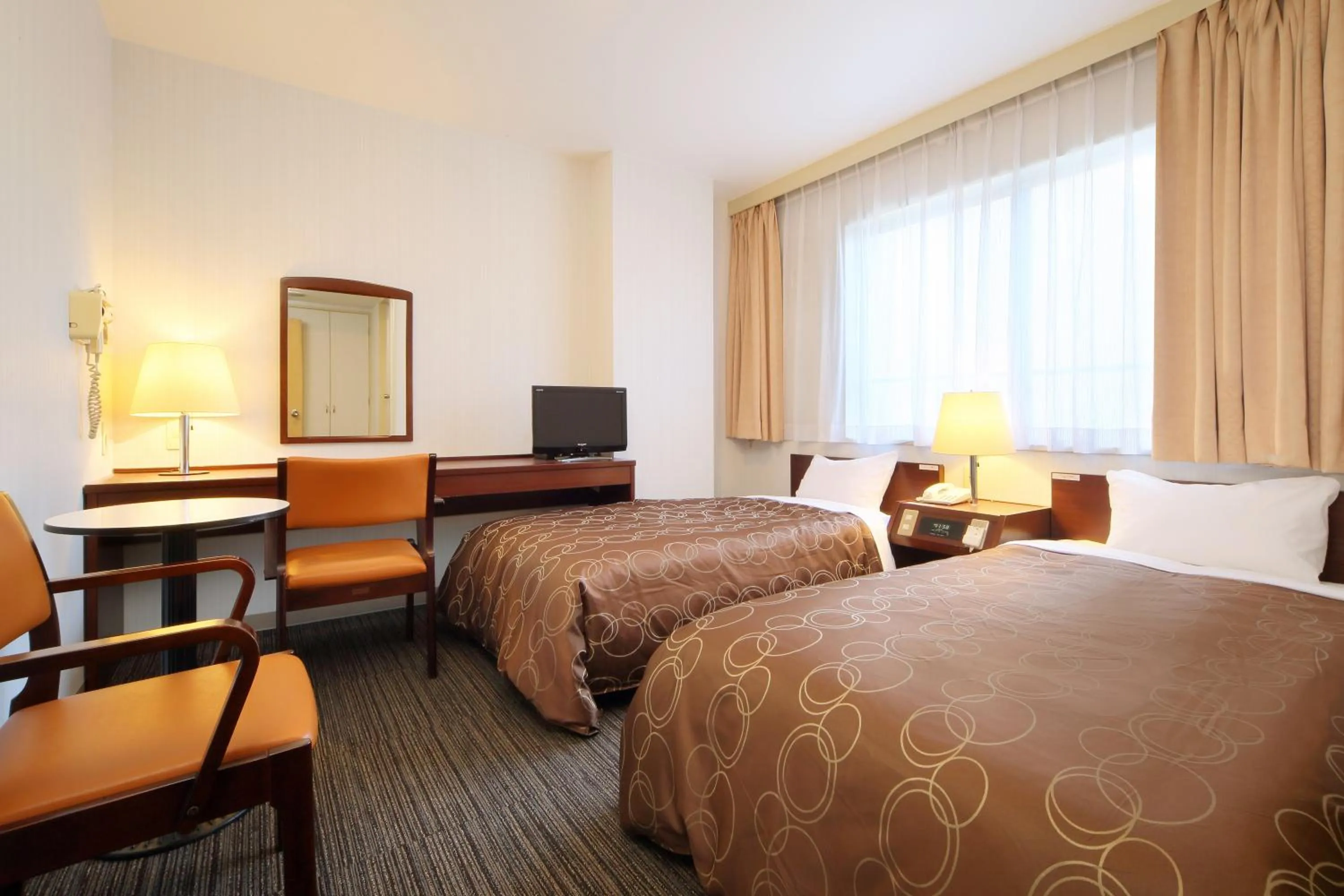 Photo of the whole room, Bed in Hotel Grand Plaza Urashima