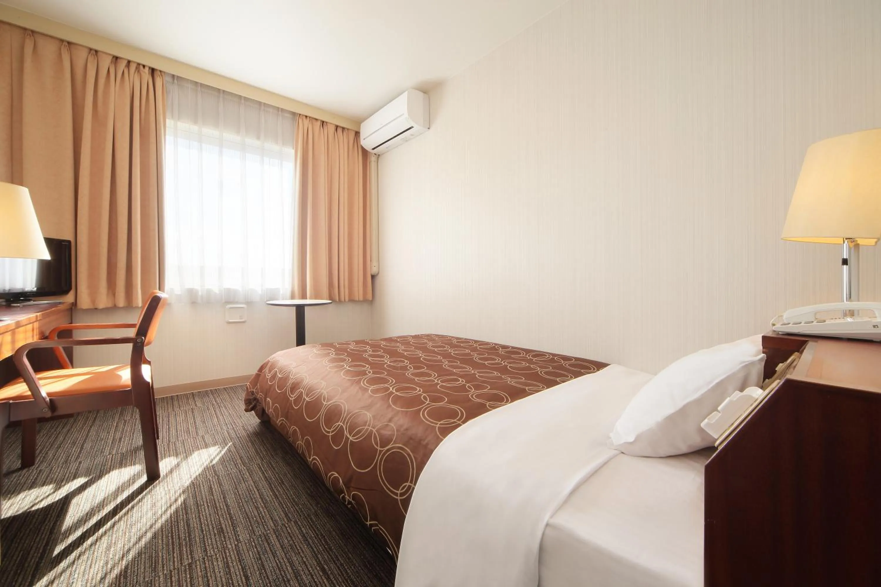 Photo of the whole room, Bed in Hotel Grand Plaza Urashima