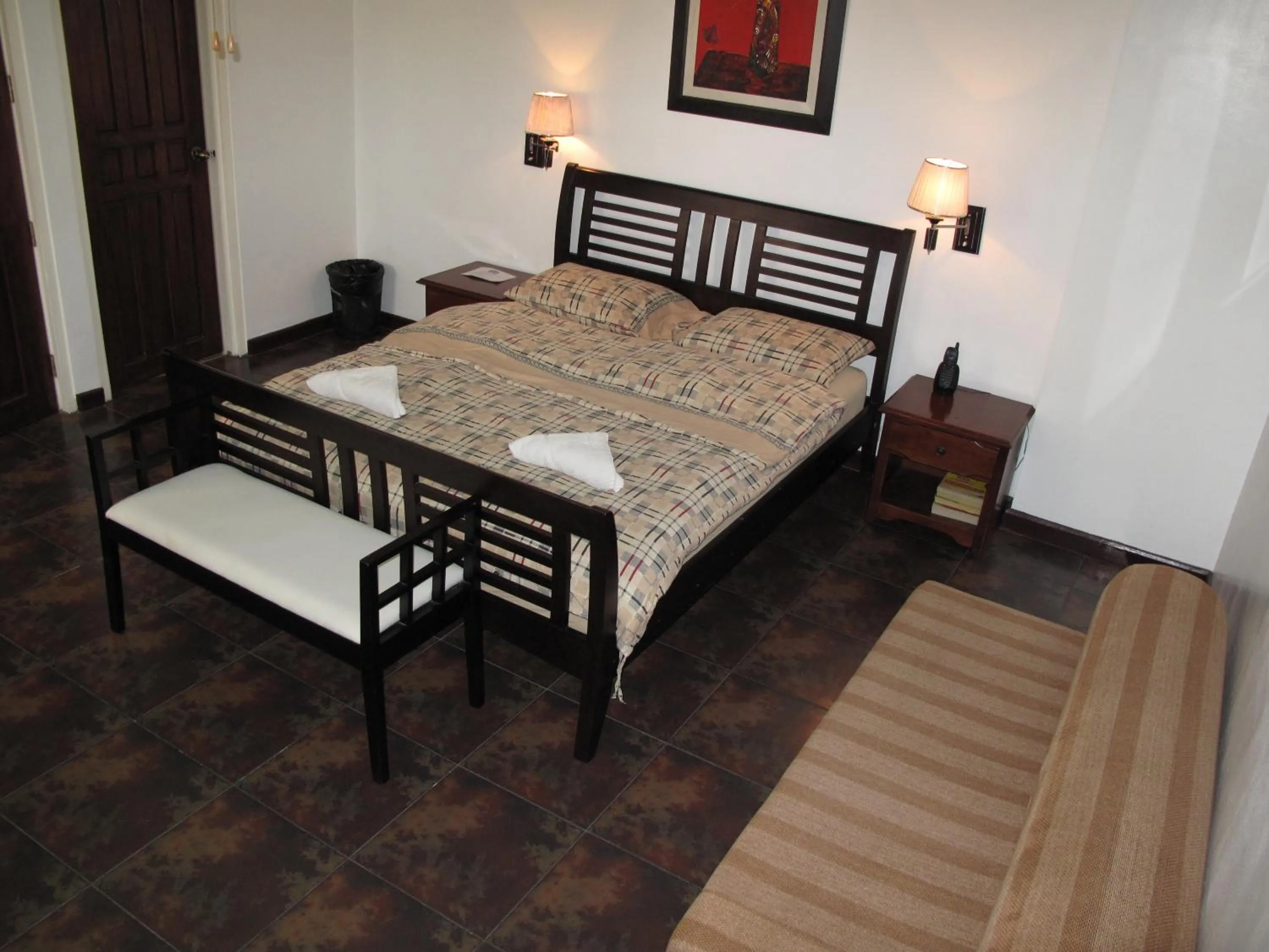 Bed in Makati Suites at Travelers Inn