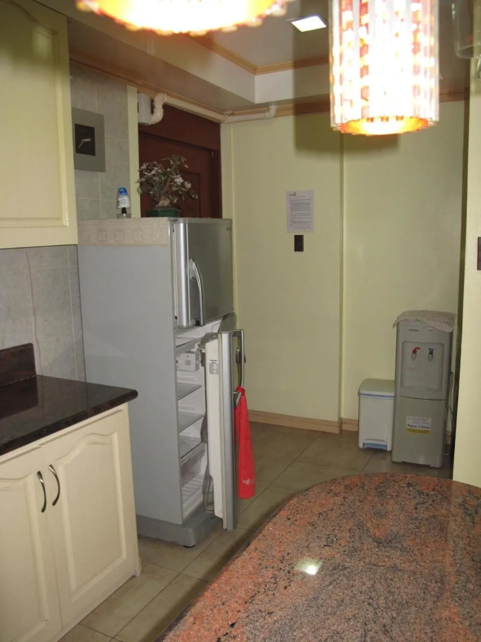 Kitchen or kitchenette in Makati Suites at Travelers Inn