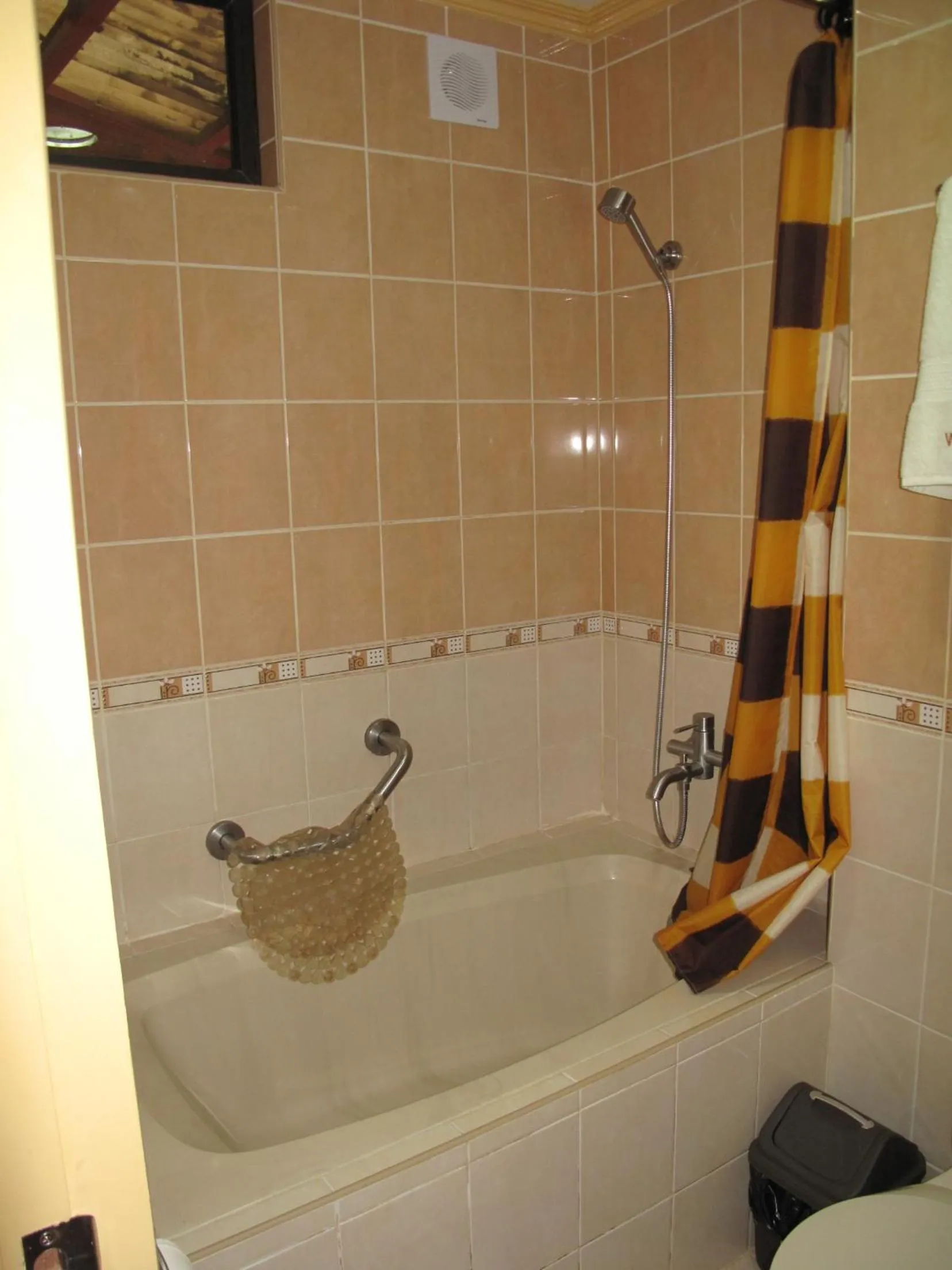 Shower in Makati Suites at Travelers Inn