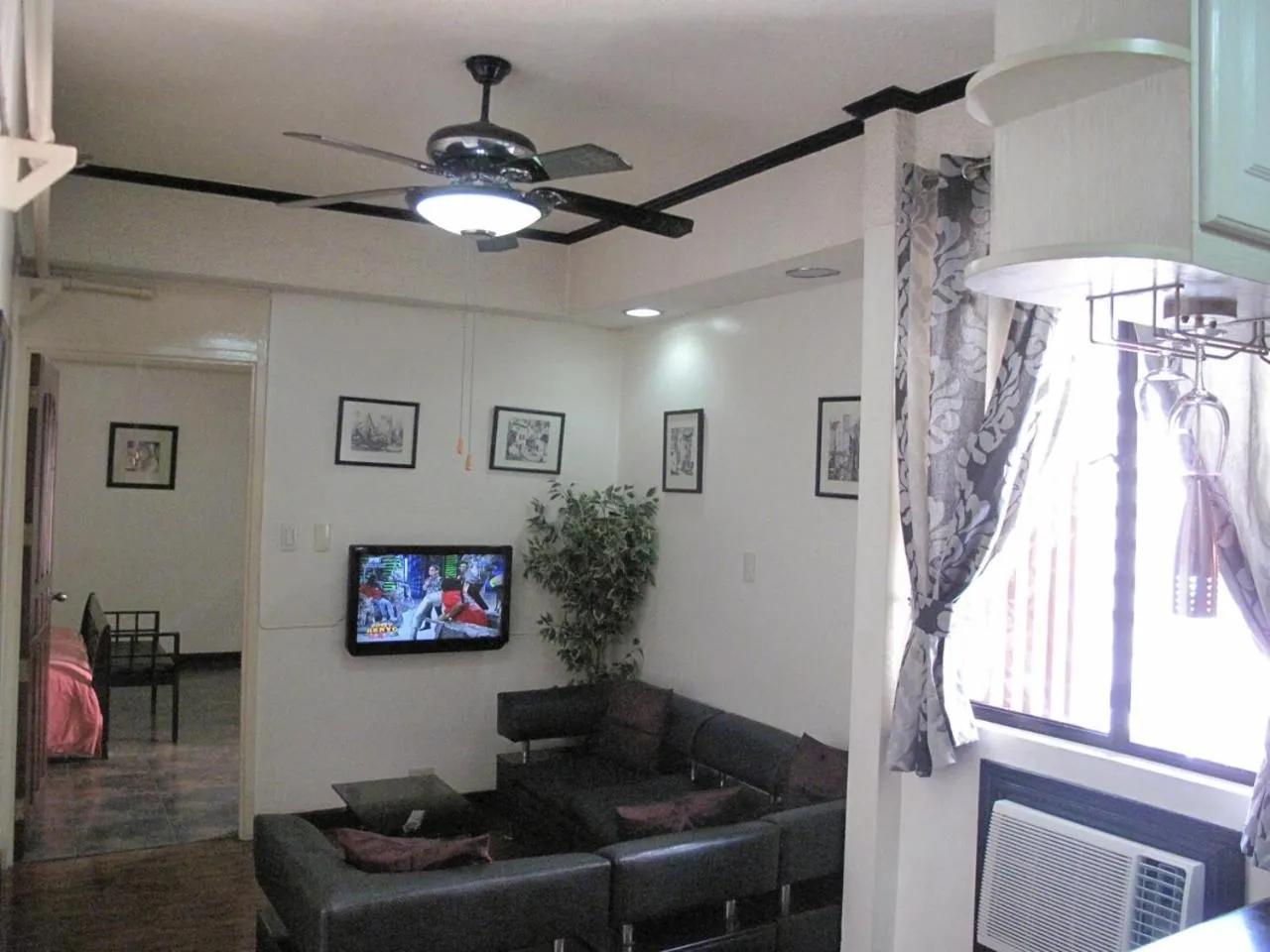 TV and multimedia in Makati Suites at Travelers Inn
