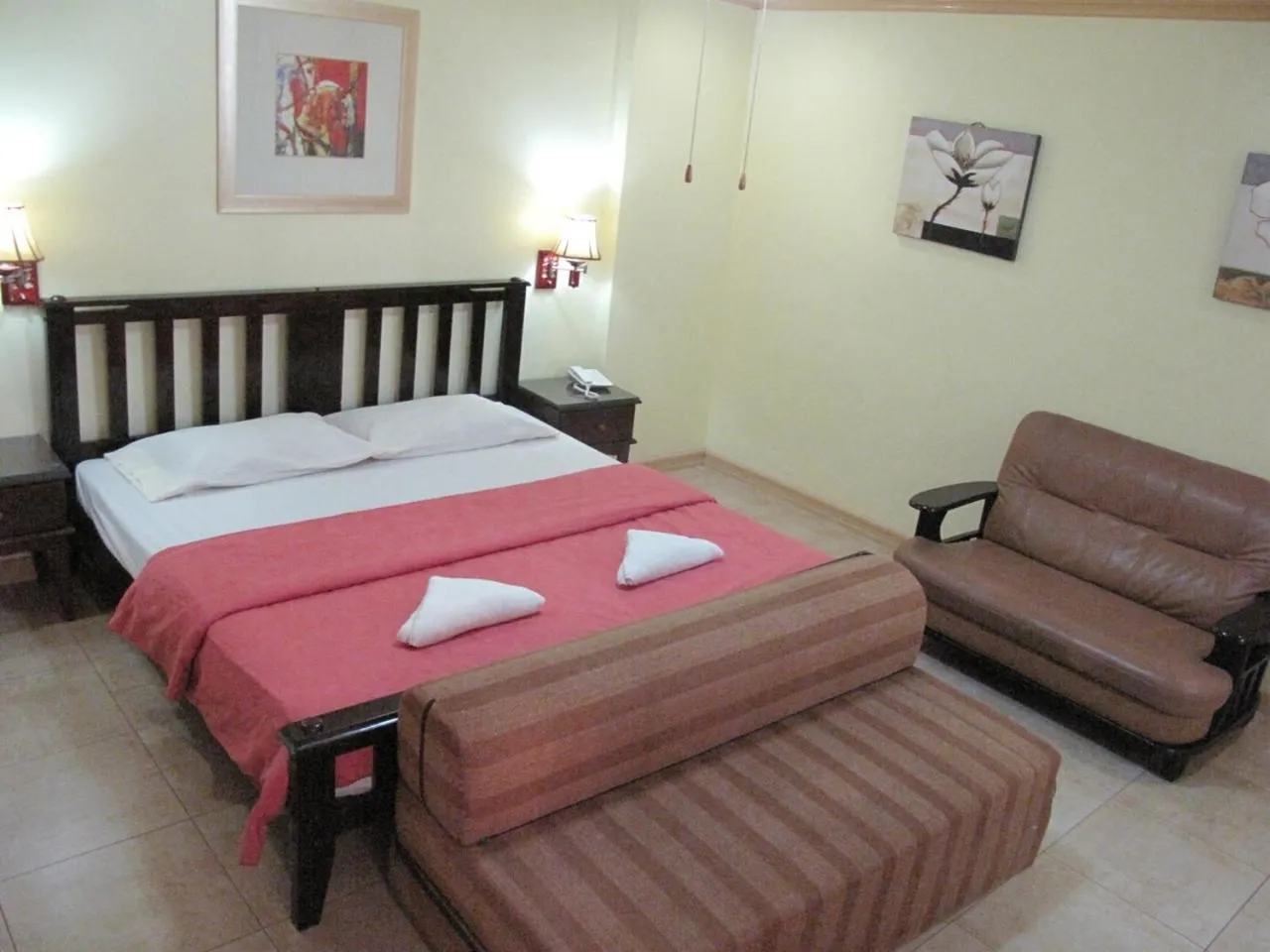 Bed in Makati Suites at Travelers Inn