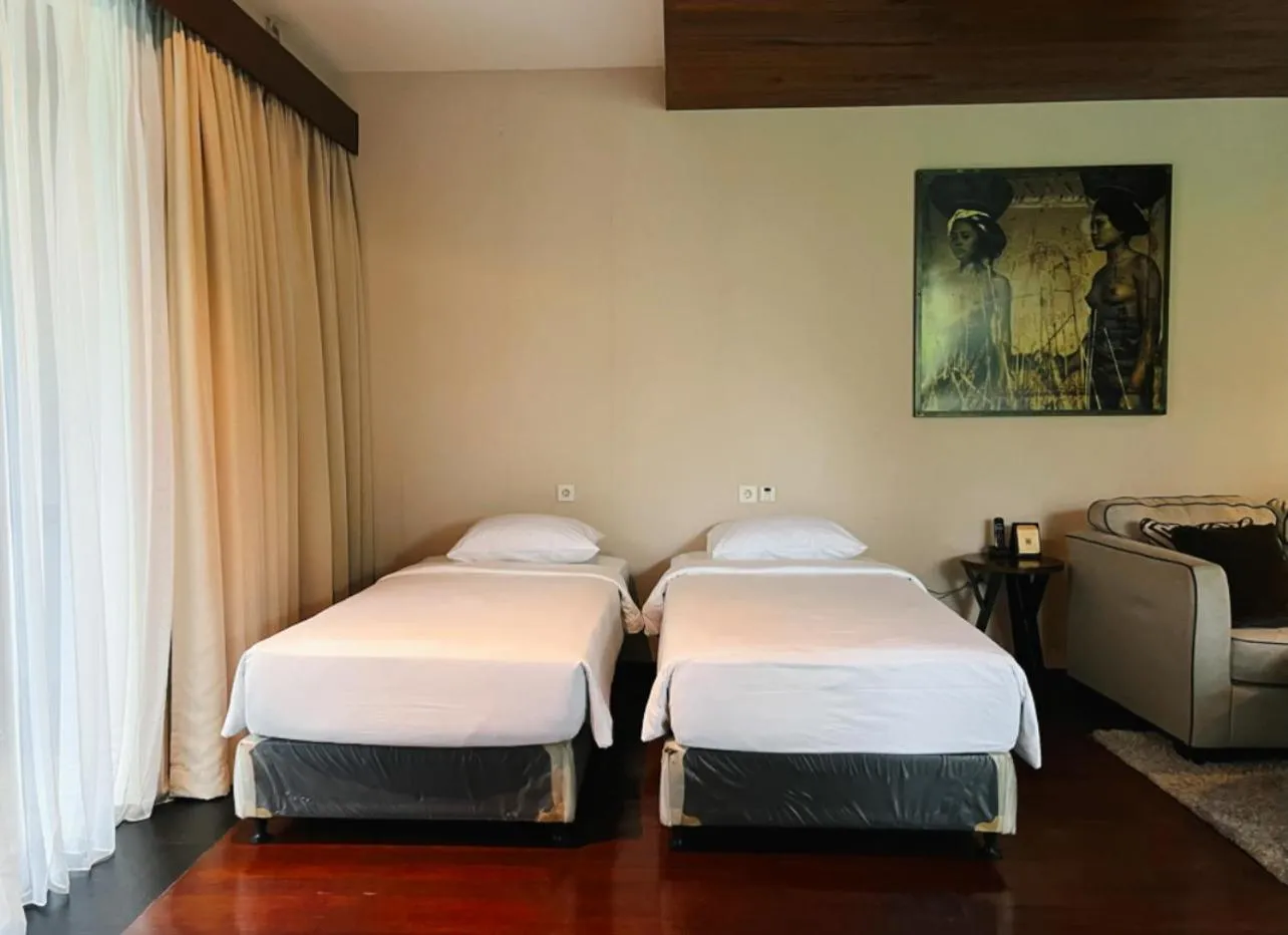 Bed in Javana Royal Villas